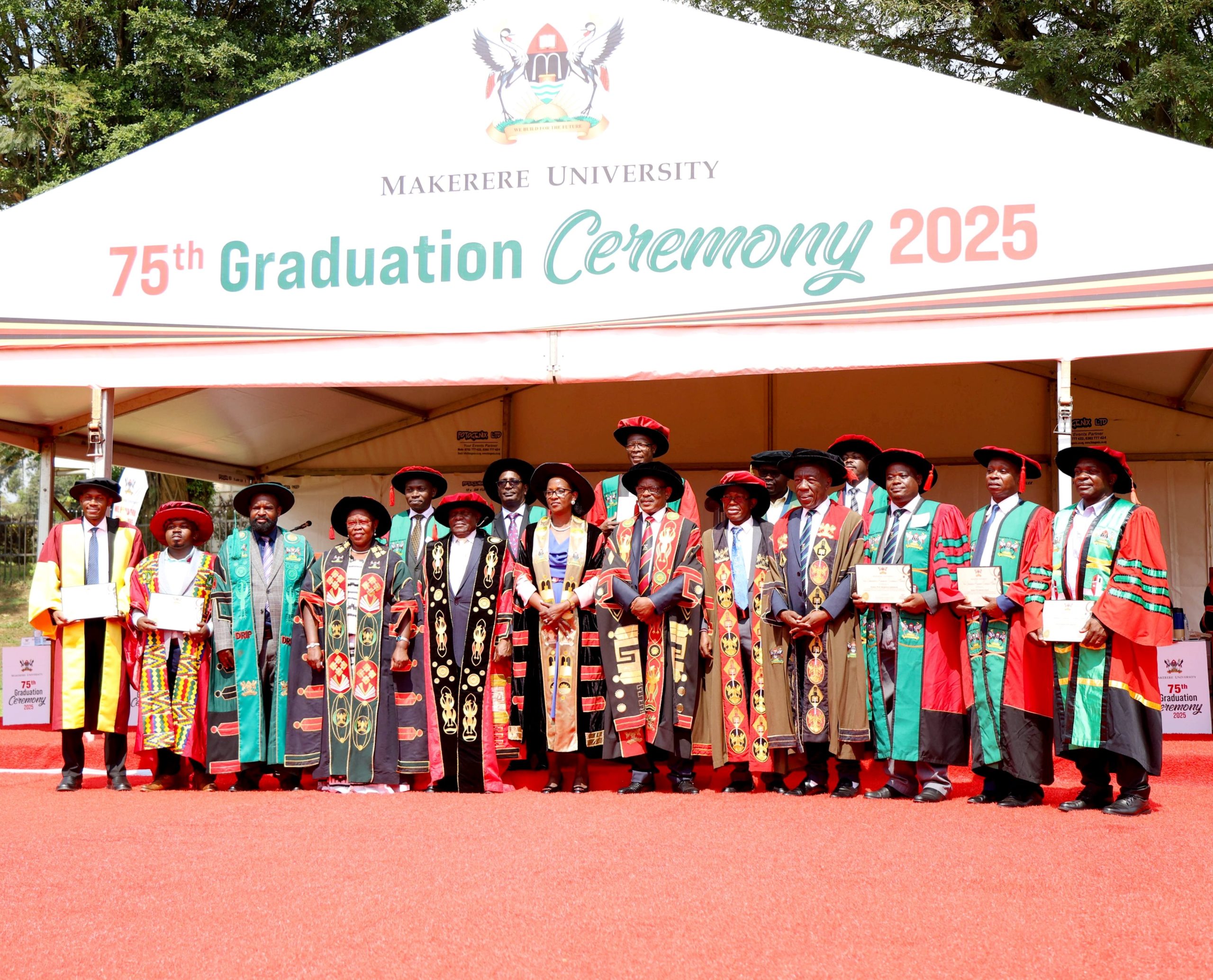 The Guest of Honour-Hon. Dr. Joyce Moriku Kaducu (4th L) and Chancellor-Hon. Dr. Crispus Kiyonga (5th L) with Chairperson Council-Mrs. Lorna Magara (6th L), VC-Prof. Barnabas Nawangwe (6th R), Ag. DVCFA-Prof. Henry Alinaitwe (4th R), AR-Prof. Buyinza Mukadasi (5th R), Chief DRIP-Dr. Robert Wamala (3rd L) and Research and Teaching Excellence Award Recipients. 75th Graduation Ceremony, Day 1, CoCIS, CEES, CoVAB and School of Law. 13th January 2025, Freedom Square, Makerere University, Kampala Uganda, East Africa.