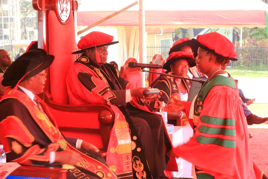 Dr Kirenga receiving her PhD Award. 75th Graduation Ceremony, Day 2, CoBAMS, CHS and CoNAS. 14th January 2025, Freedom Square, Makerere University, Kampala Uganda, East Africa.