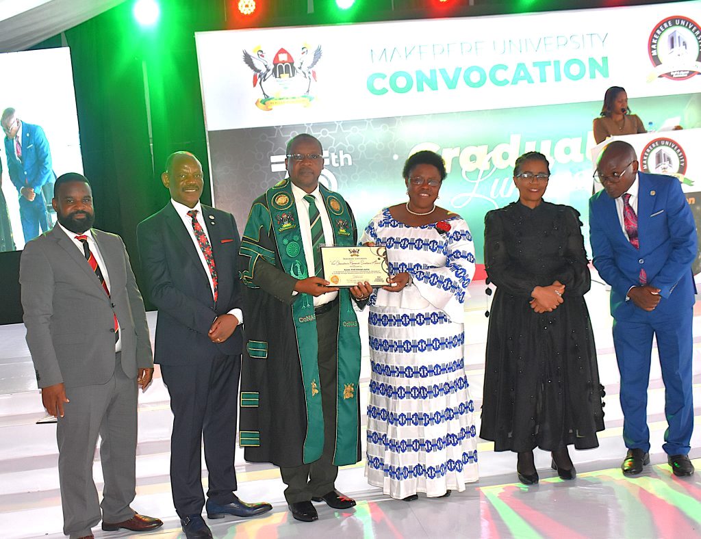 Prof. Juma Kasozi received the Senior Researchers Award. 75th Graduation Ceremony, Day 2, CoBAMS, CHS and CoNAS. 14th January 2025, Freedom Square, Makerere University, Kampala Uganda, East Africa.