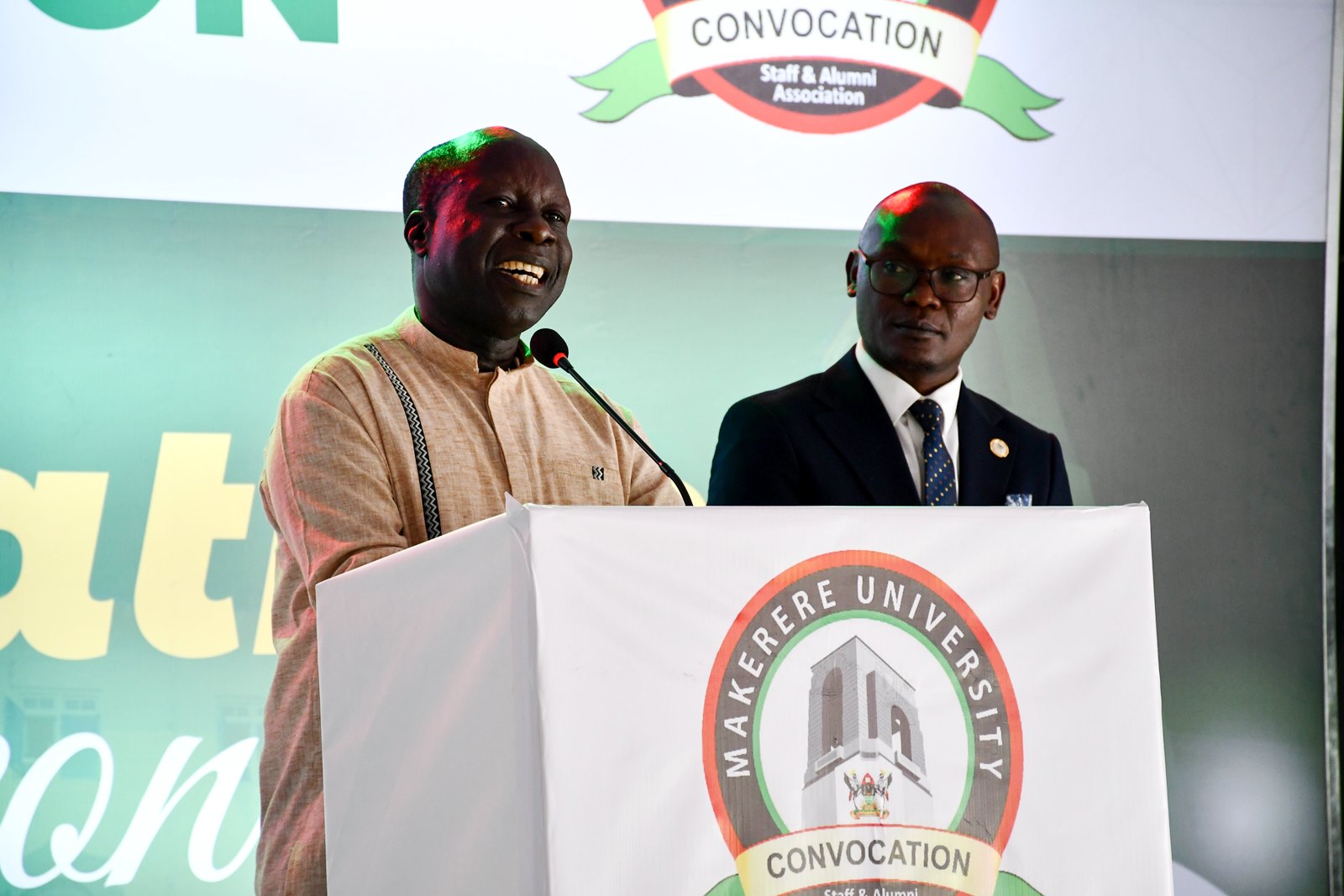 Dr. Tanga Odoi (Left) and Mr. George Turyamureeba (Right) address the congregation. 75th Graduation Ceremony, Day 3, MUBS. Convocation Luncheon, 15th January 2025, Edge Road, Makerere University, Kampala Uganda, East Africa.