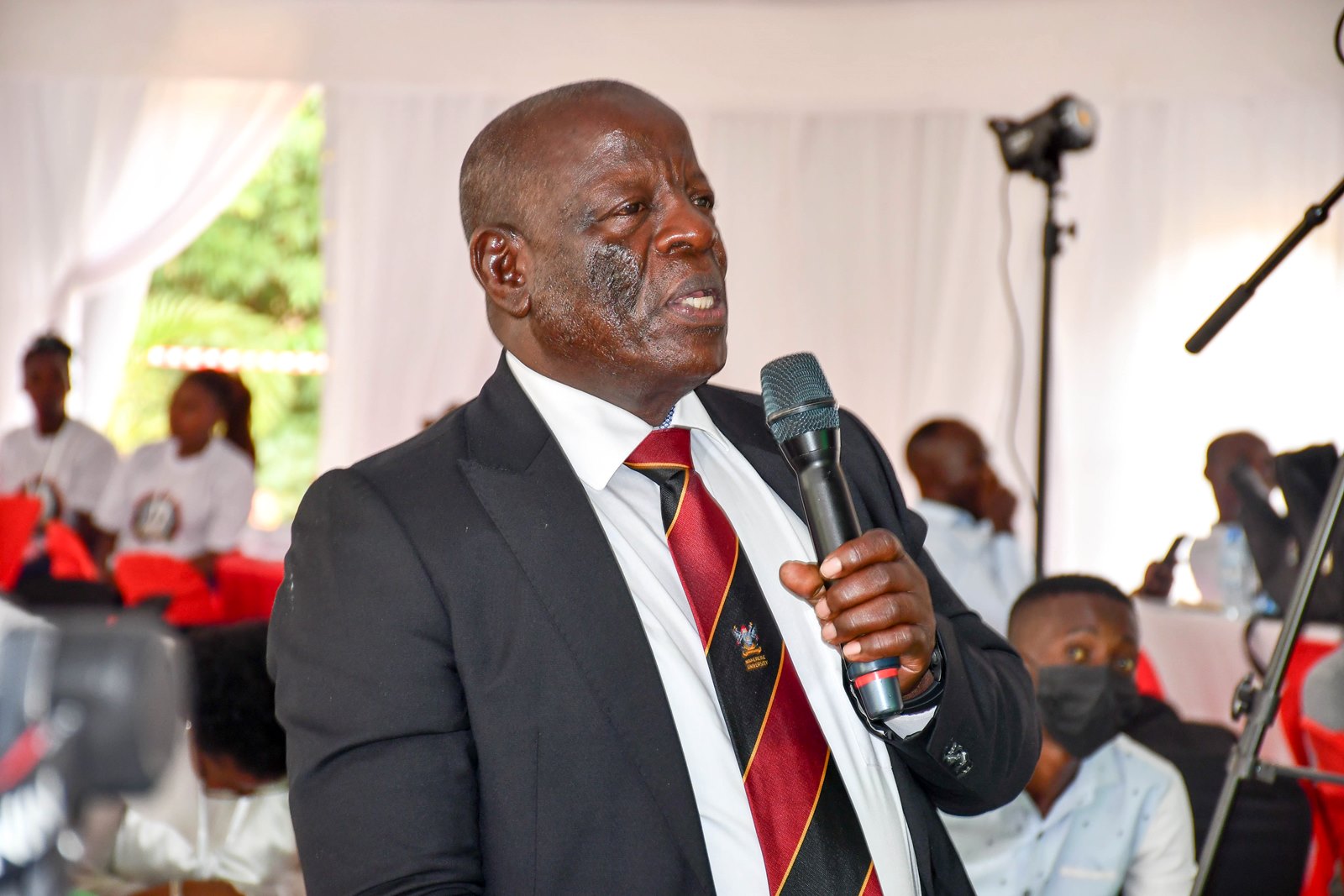 Engineer Isaac Mubarak Ngobya addresses the congregation at the Luncheon. 75th Graduation Ceremony, Day 3, MUBSS. Convocation Luncheon, 15th January 2025, Edge Road, Makerere University, Kampala Uganda, East Africa.