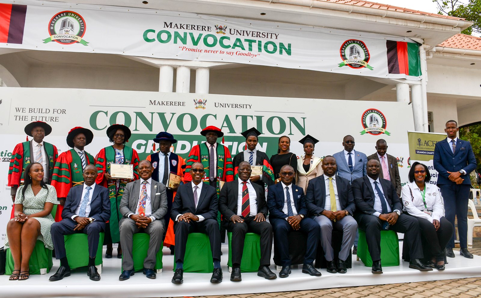 Seated: Engineer Isaac Mubarak Ngobya (C), Prof. Barnabas Nawangwe (3rd L), Prof. Moses Muhwezi (2nd L), Mr. Odrek Rwabwogo (4th L), Mr. George Turyamureeba (4th R), Ms. Grace Cherotich Ruto (R) in a group photo with offials and Award Recipients from MUBS. 75th Graduation Ceremony, Day 3, MUBS. Convocation Luncheon, 15th January 2025, Edge Road, Makerere University, Kampala Uganda, East Africa.