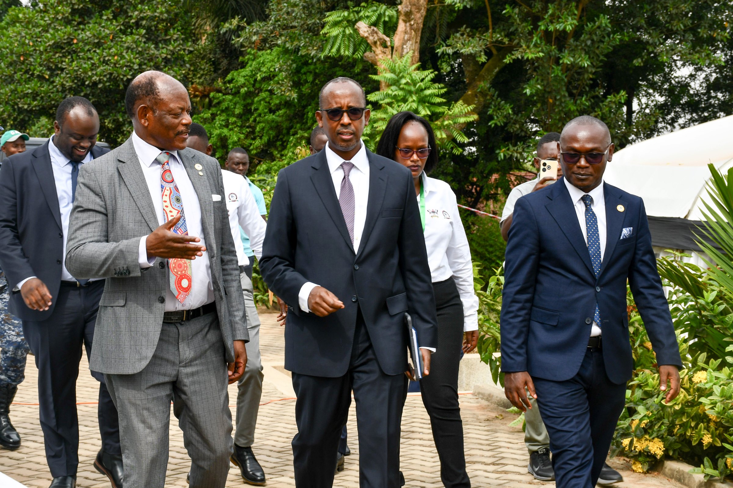 The Vice Chancellor-Prof. Barnabas Nawangwe (Left) and Chairman Convocation-Mr. George Mugabi Turyamureeba (Right) receive the Chairperson PACEID-Mr. Odrek Rwabwogo (Centre) upon his arrival at the Convocation House. 75th Graduation Ceremony, Day 3, MUBSS. Convocation Luncheon, 15th January 2025, Edge Road, Makerere University, Kampala Uganda, East Africa.