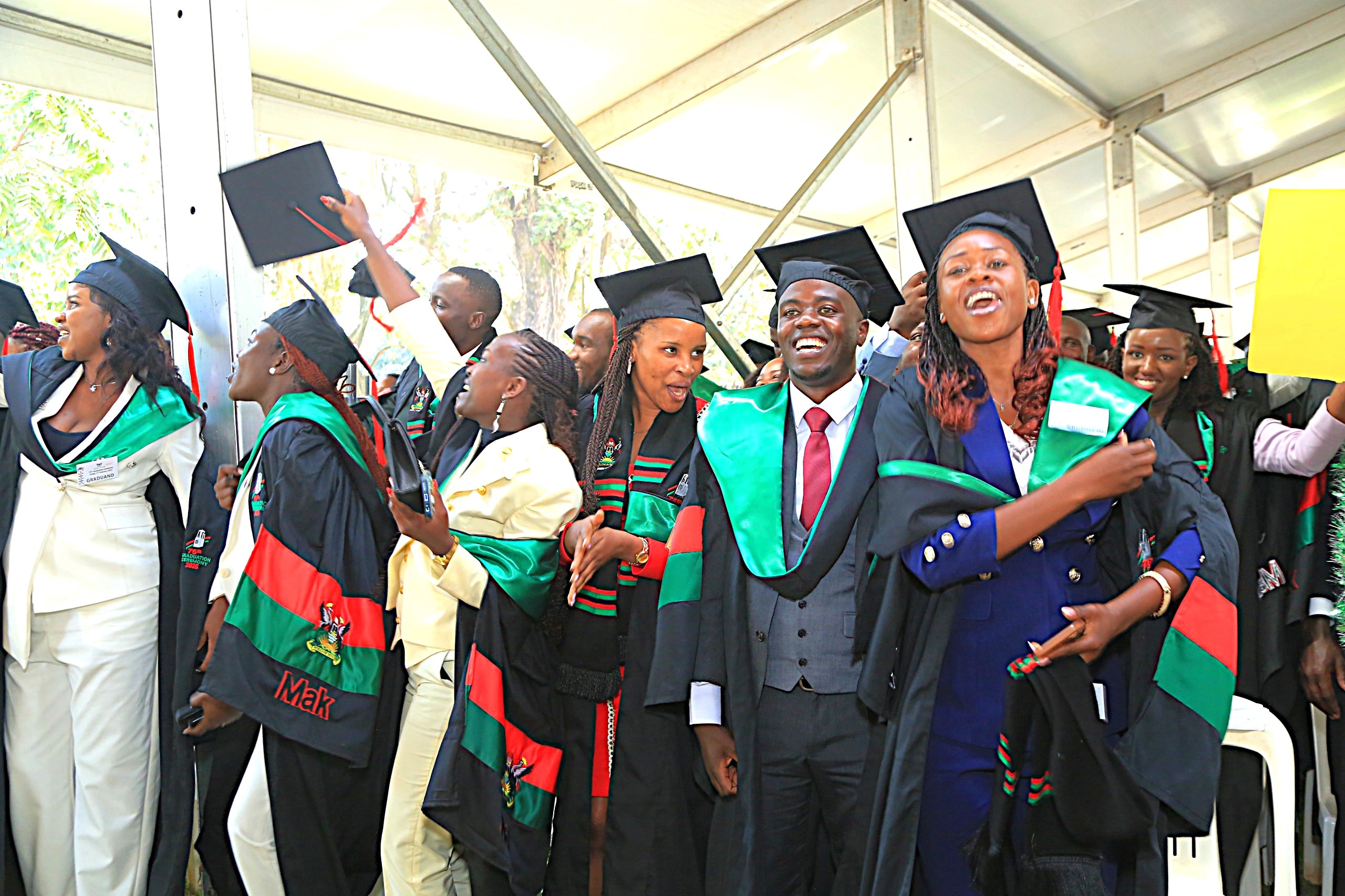 CAES graduates celebrating their achievement. 75th Graduation Ceremony, Day 5, CAES, CEDAT and CHUSS. 17th January 2025, Freedom Square, Makerere University, Kampala Uganda, East Africa.