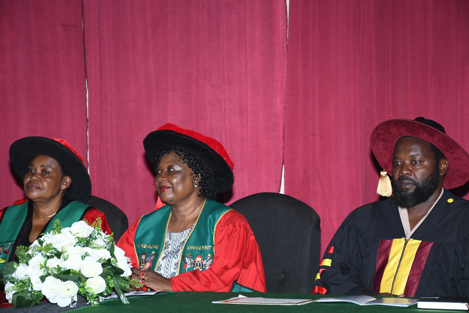 Dr. Harriet Nabushawo (Centre), Dr. Oscar Mugula (Right) and another official follow proceedings. Centre for Life-Long Learning (CLL), College of Education and External Studies (CEES) over 40 students of the 6th Cohort successfully graduate with diplomas and certificates in various fields accredited by the Uganda Business and Technical Examinations Board (UBTEB), 24th January 2025, College of Engineering, Design, Art and Technology (CEDAT) Conference Hall, Makerere University, Kampala Uganda, East Africa.