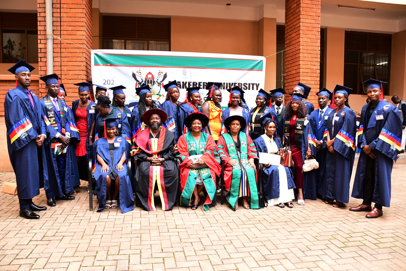 Officials pose for a group photo with some of the over 40 graduates of the 6th Cohort of UBTEB-accredited diplomas and certificates offered by CLL. Centre for Life-Long Learning (CLL), College of Education and External Studies (CEES) over 40 students of the 6th Cohort successfully graduate with diplomas and certificates in various fields accredited by the Uganda Business and Technical Examinations Board (UBTEB), 24th January 2025, College of Engineering, Design, Art and Technology (CEDAT) Conference Hall, Makerere University, Kampala Uganda, East Africa.