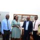 Dean School of Education-Prof. Mulumba Mathias (2nd L), Directorate of Human Resources' Mr. Patrick Mutebi (2nd R), Internal Audit Directorate's Ms. Mbabazi Winnie (R) and another official witness as Dr. John Ssentongo (3rd R) hands over to Dr. Marjorie Batiibwe (3rd L). Department of Science, Technical and Vocational Education (DSTVE), School of Education, College of Education and External Studies (CEES) transition in leadership from Dr. John Ssentongo to Dr. Marjorie Batiibwe, January 28, 2025, Makerere University, Kampala Uganda, East Africa.