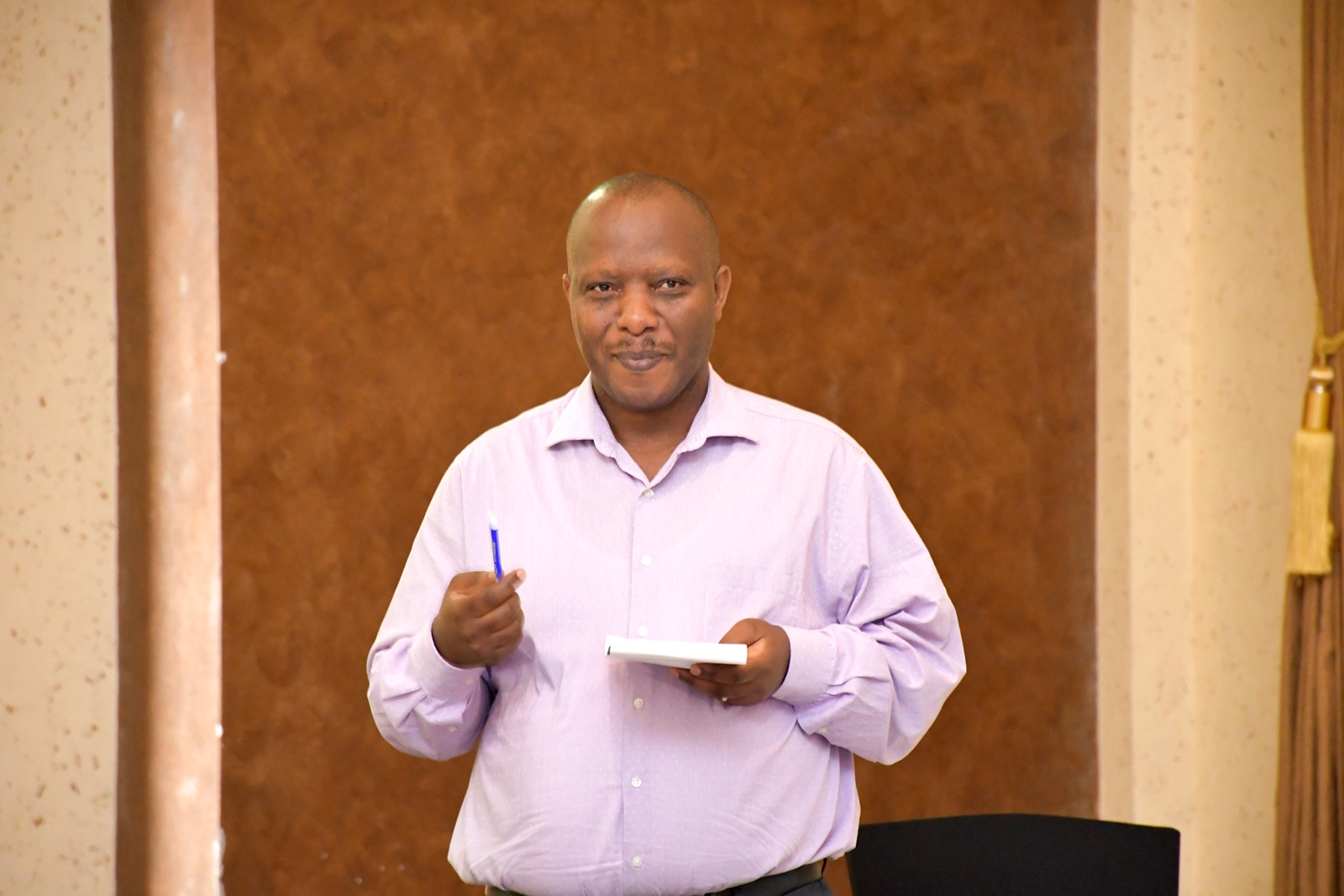 Dr. Herbert Tumwebaze, who represented the HoD. College of Education and External Studies (CEES), Makerere University in collaboration with international partners dissemination seminar of study on "Enacted Citizenship in Times of Uncertainty," ocused on teachers' lived experiences during the COVID-19 pandemic in Uganda and Tanzania, Nican Resort Hotel, Kampala Uganda, East Africa.