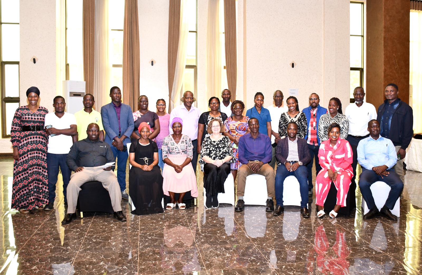 A group photo of researchers and workshop participants. College of Education and External Studies (CEES), Makerere University in collaboration with international partners dissemination seminar of study on "Enacted Citizenship in Times of Uncertainty," ocused on teachers' lived experiences during the COVID-19 pandemic in Uganda and Tanzania, Nican Resort Hotel, Kampala Uganda, East Africa.