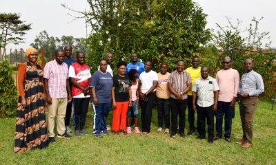 Staff pose for a group photo during the activity. School of Economics, College of Business and Management Sciences (CoBAMS), Makerere University, Kampala team-building activity, 15th January 2025, Buwatte, Wakiso, Uganda, East Africa.