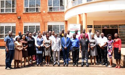 Prof. Buyinza Mukadasi and Prof. Mathias Mulumba (Centre) pose for a group photo with participants after the closing ceremony on 21st February 2025. The Office of the Deputy Vice Chancellor (Academic Affairs) and the College of Education and External Studies (CEES) through the Centre of Teaching and Learning Support (CTLS) are implementing the Pedagogy and Professionalism course, First Cohort of 50, 19th to 21st February 2025, School of Business Conference Room, Makerere University, Kampala Uganda, East Africa.