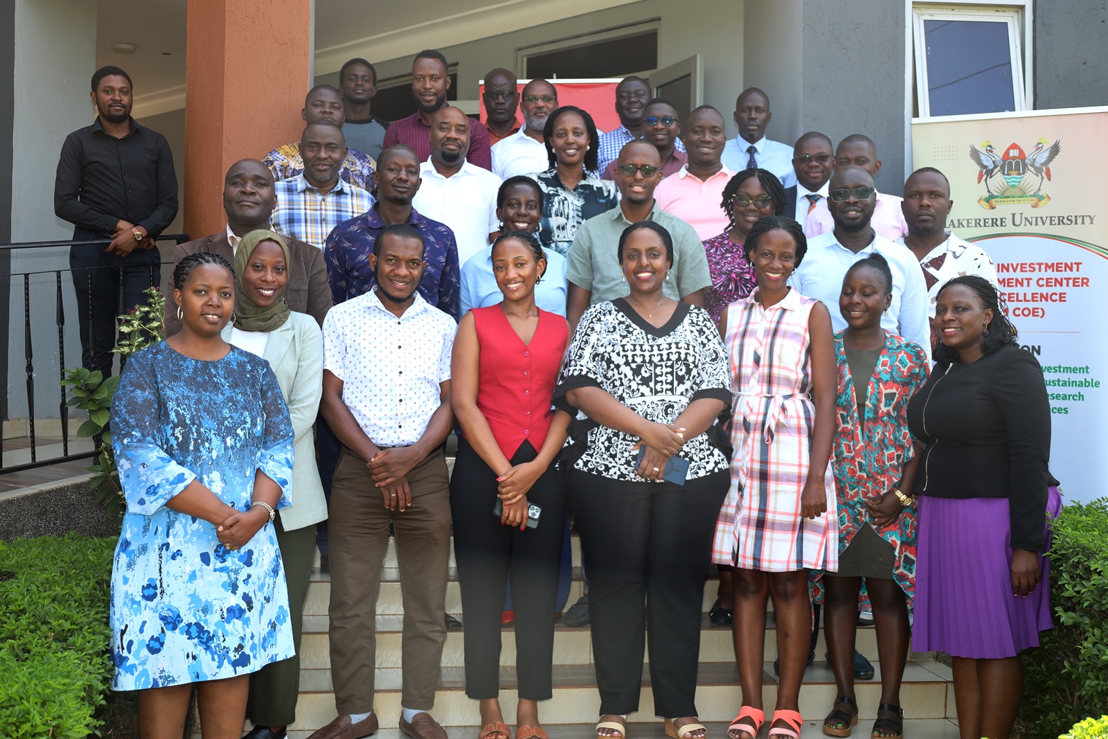 Dr. John Sseruyange (2nd Row Left) poses for a group photo with participants on Day 1 of the training, 19th February 2025 in Jinja. Public Investment Management (PIM) Centre of Excellence, College of Business and Management Sciences (CoBAMS), Makerere University, Kampala, Day 1 of three-day refresher training for members of the Development Committee (DC) of the Ministry of Finance, Planning and Economic Development, 19th February 2024, Jinja Uganda, East Africa.