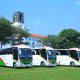 Vice Chancellor, Prof. Barnabas Nawangwe hands over three (3) university buses to leadership in the College of Agricultural and Environmental Sciences (CAES), the College of Health Sciences (CHS), and the College of Veterinary Medicine, Animal Resources and Biosecurity (CoVAB) to improve students' practical learning experiences by ensuring reliable transportation for fieldwork and community outreach, 3rd February 2025, Freedom Square, The three buses parked in the Freedom Square against the backdrop of the Main Building on 3rd February 2025. Makerere University, Kampala Uganda, East Africa.