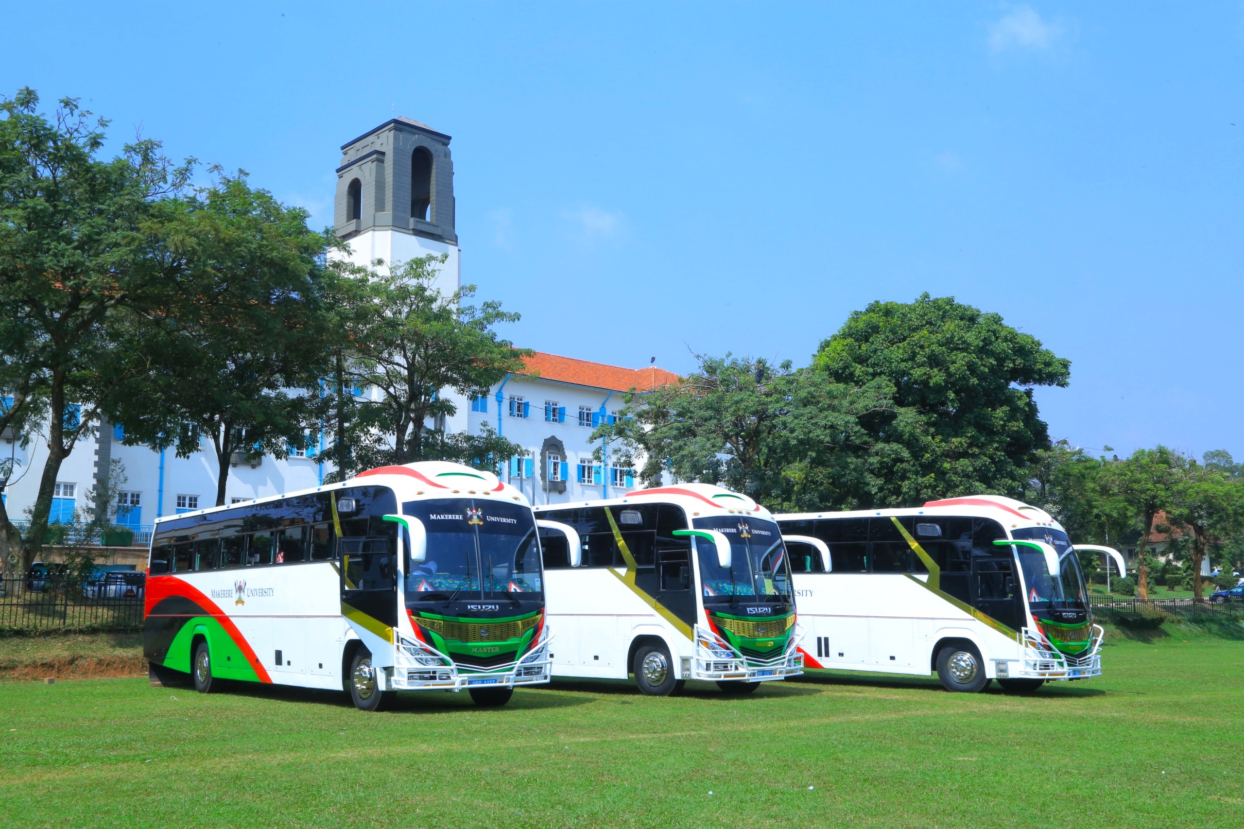 Vice Chancellor, Prof. Barnabas Nawangwe hands over three (3) university buses to leadership in the College of Agricultural and Environmental Sciences (CAES), the College of Health Sciences (CHS), and the College of Veterinary Medicine, Animal Resources and Biosecurity (CoVAB) to improve students' practical learning experiences by ensuring reliable transportation for fieldwork and community outreach, 3rd February 2025, Freedom Square, The three buses parked in the Freedom Square against the backdrop of the Main Building on 3rd February 2025. Makerere University, Kampala Uganda, East Africa.