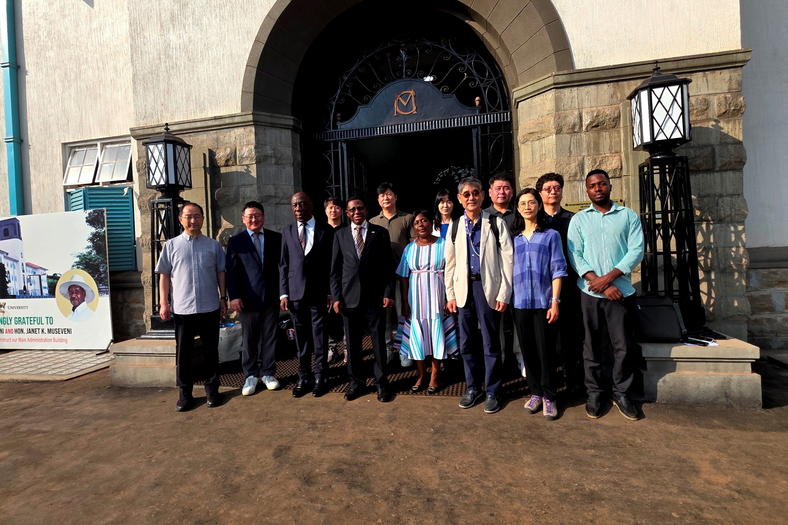 Prof. Buyinza Mukadasi, Prof. Henry Alinaitwe and Prof. Venny Nakazibwe pose for a group photo with members of the delegation at the Main Building entrance. Prof. Henry Alinaitwe, Prof. Buyinza Mukadasi, meeting with project implementation partners from the Korea Institute for Development Strategy (KDS) and the Korea National Open University (KNOU) to discuss the upcoming Project for Enhancing the Distance Education Environment at Makerere University in Uganda (2024-2028), 18th February 2025, Kampala, East Africa.