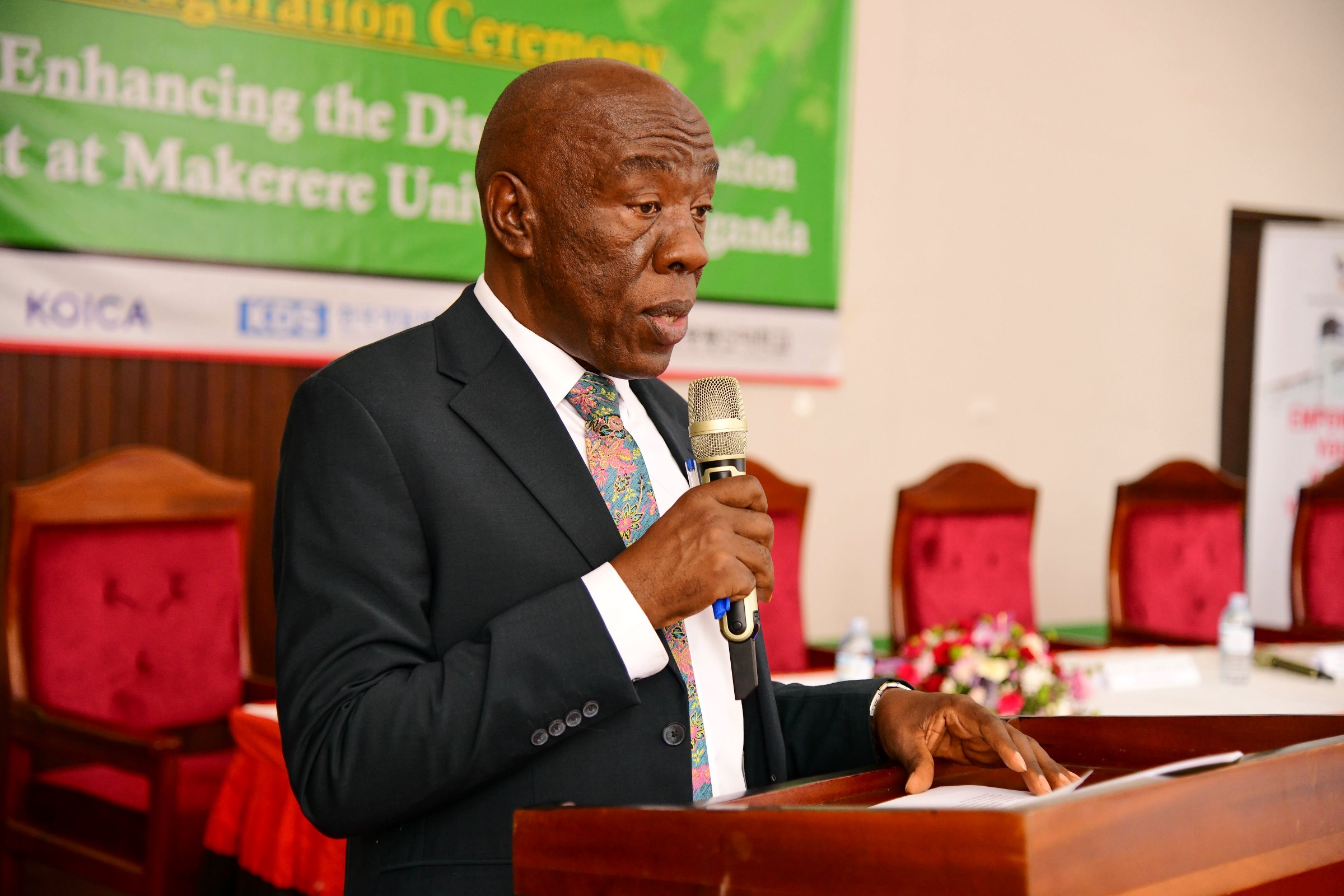 Prof. Henry Alinaitwe, the project Principal Investigator makes his remarks. Launch of a US$12.2million Korea International Cooperation Agency (KOICA) funded project to enhance the Distance Education Environment by Hon. Dr. John Chrysostom Muyingo, 27th February 2025, Main Hall, Main Building, Makerere University, Kampala Uganda, East Africa.