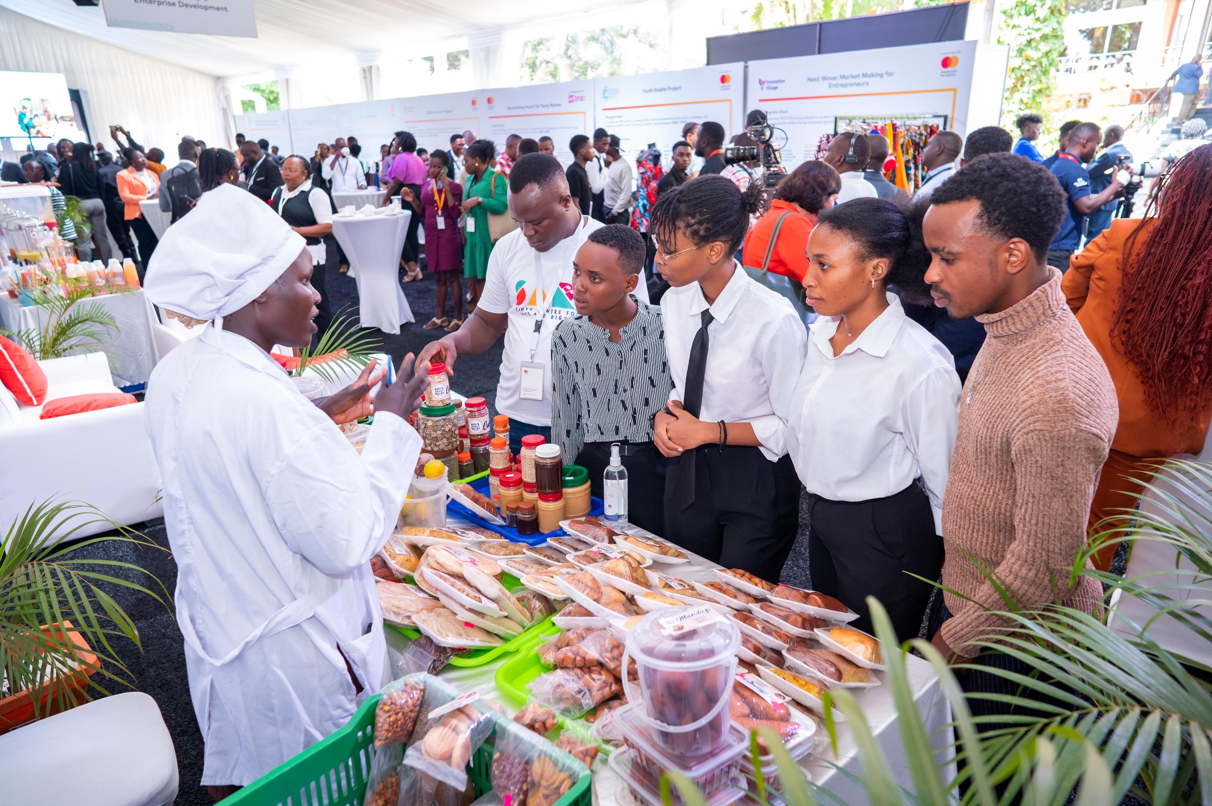 Some of the young people who attended the event displaying products from their Entreprenuerial Projects. Young Africa Works Dialogue 2025 event at the Kampala Serena Hotel, participation by Mastercard Foundation Scholars Program at Makerere University, Kampala Uganda, East Africa.