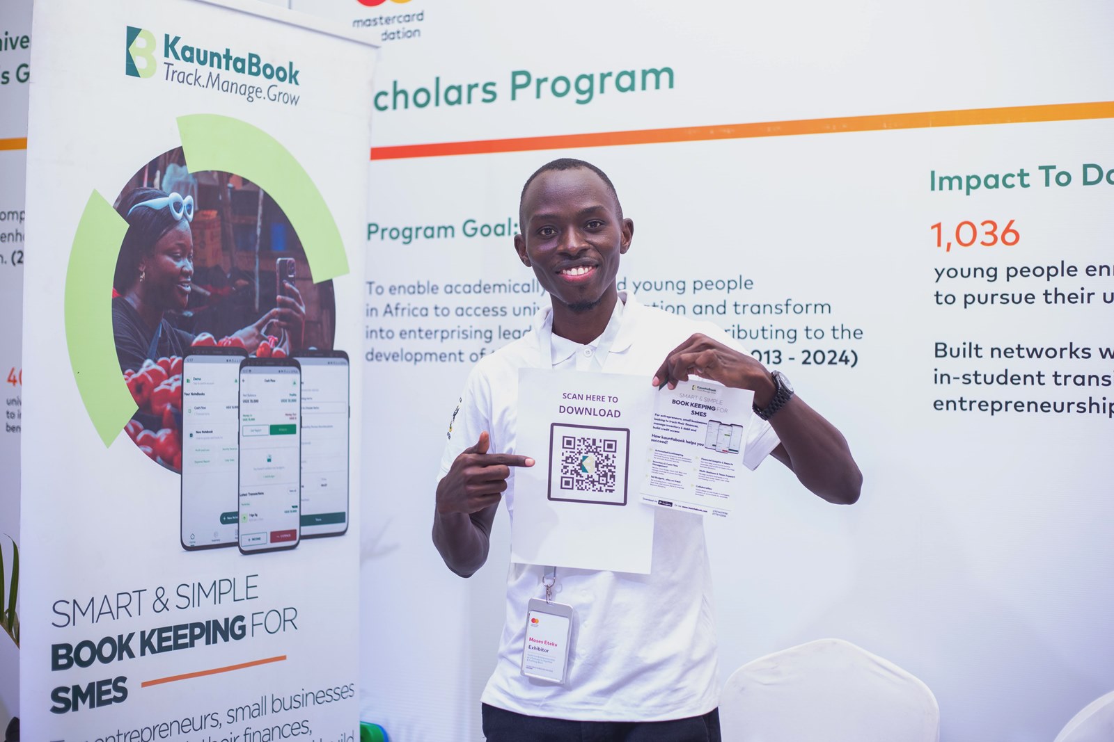 Moses Eteku an alumnus of Matercard Foundation Scholars Program at Makerere University showcasing his technology solution innovation. Young Africa Works Dialogue 2025 event at the Kampala Serena Hotel, participation by Mastercard Foundation Scholars Program at Makerere University, Kampala Uganda, East Africa.