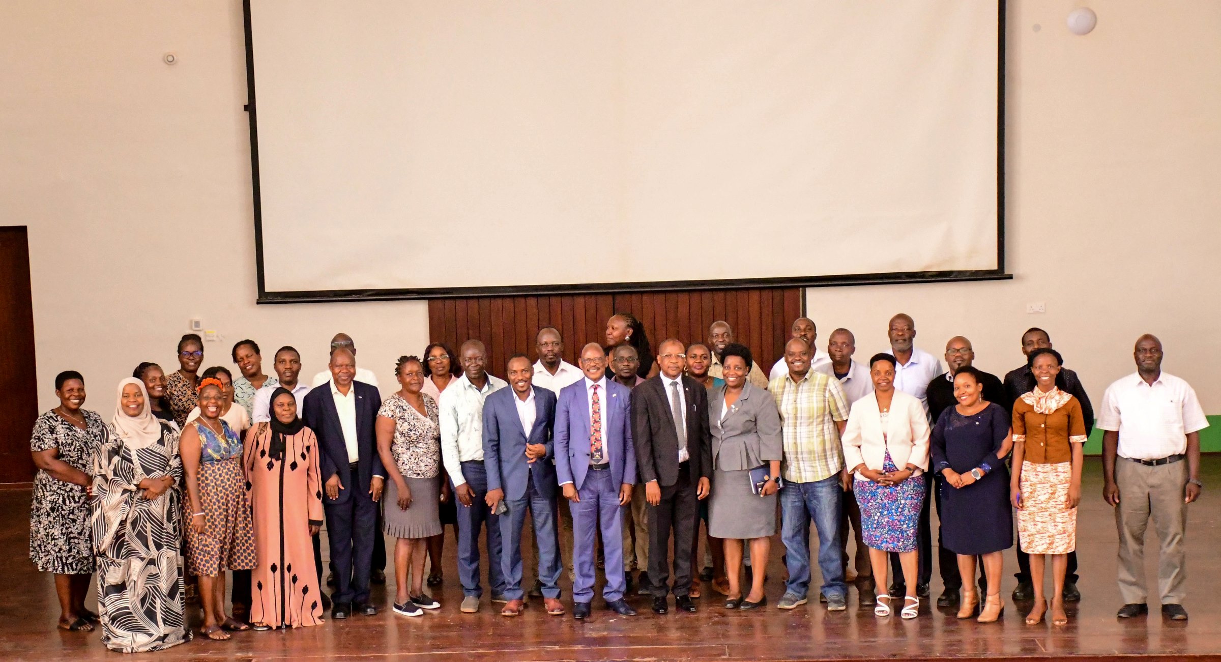 MUMCS Members pose for a group photo with their Chairperson-Prof. Barnabas Nawangwe, Secretary-Prof. Winston Tumps Ireeta and Treasurer-Prof. Juma Kasozi at the AGM on 26th February 2025. Makerere University Multi-Purpose Co-operative Society (MUMCS) Annual General Meeting (AGM) to discuss the Society’s financial performance, progress and future plans, 26th February 2025, Main Hall, Kampala Uganda, East Africa.