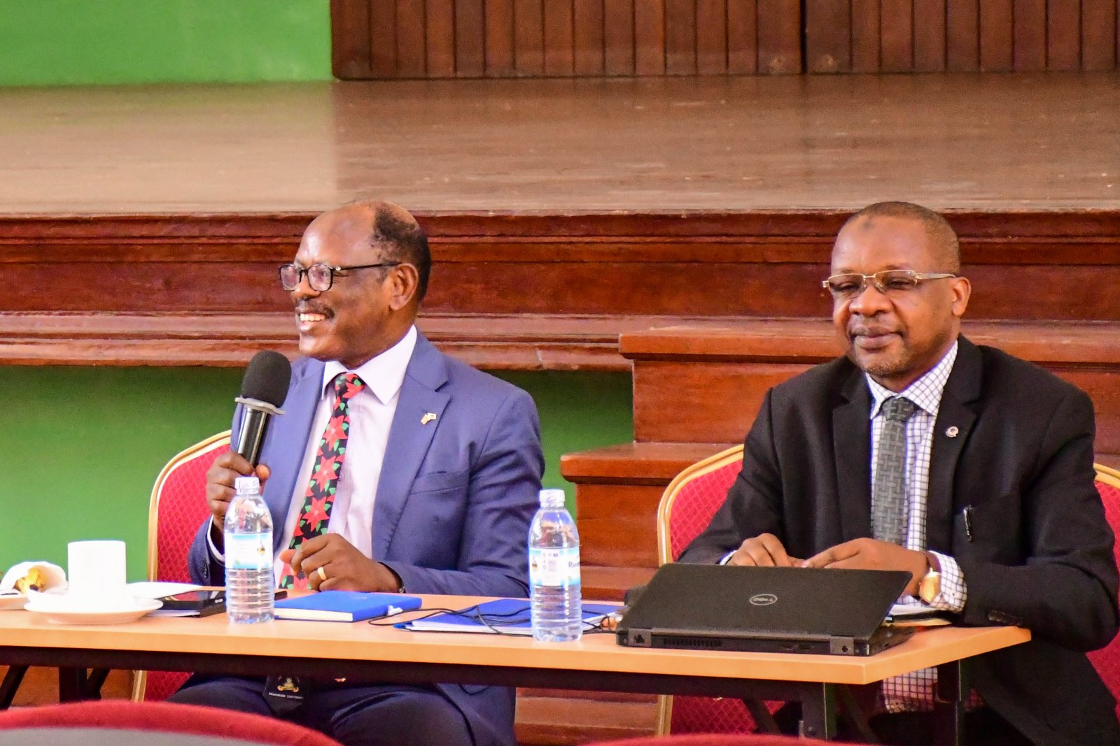 Prof. Barnabas Nawangwe (Left) delivers the Chairperson's address alongside Prof. Juma Kasozi (Right). Makerere University Multi-Purpose Co-operative Society (MUMCS) Annual General Meeting (AGM) to discuss the Society’s financial performance, progress and future plans, 26th February 2025, Main Hall, Kampala Uganda, East Africa.