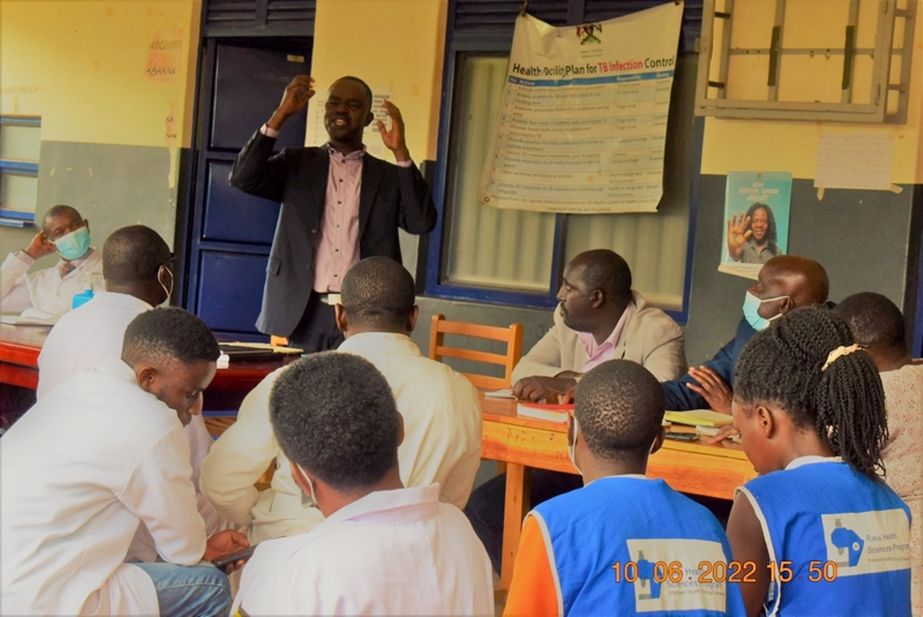 The Commissioner in charge of Reproductive Health at the Ministry of Health, Dr. Richard Mugahi, addressing health facility staff at Ntuusi Health Centre. Team from the Ministry of Health, and Makerere University, Kampala visit Ntuusi Health Centre IV in Sembabule district, Uganda, East Africa to follow-up on a mentorship training that was done a month earlier by Makerere University under the RMNCAH (Reproductive, Maternal, Neonatal, Child and Adolescent Health) Project.