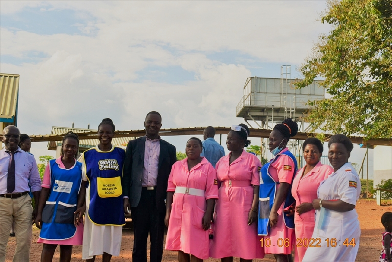 Dr. Richard Mugahi (4th Left) poses for a group photo with Sebambule District Leaders and Staff at Ntuusi Health Centre IV on 10th June 2022. Team from the Ministry of Health, and Makerere University, Kampala visit Ntuusi Health Centre IV in Sembabule district, Uganda, East Africa to follow-up on a mentorship training that was done a month earlier by Makerere University under the RMNCAH (Reproductive, Maternal, Neonatal, Child and Adolescent Health) Project.