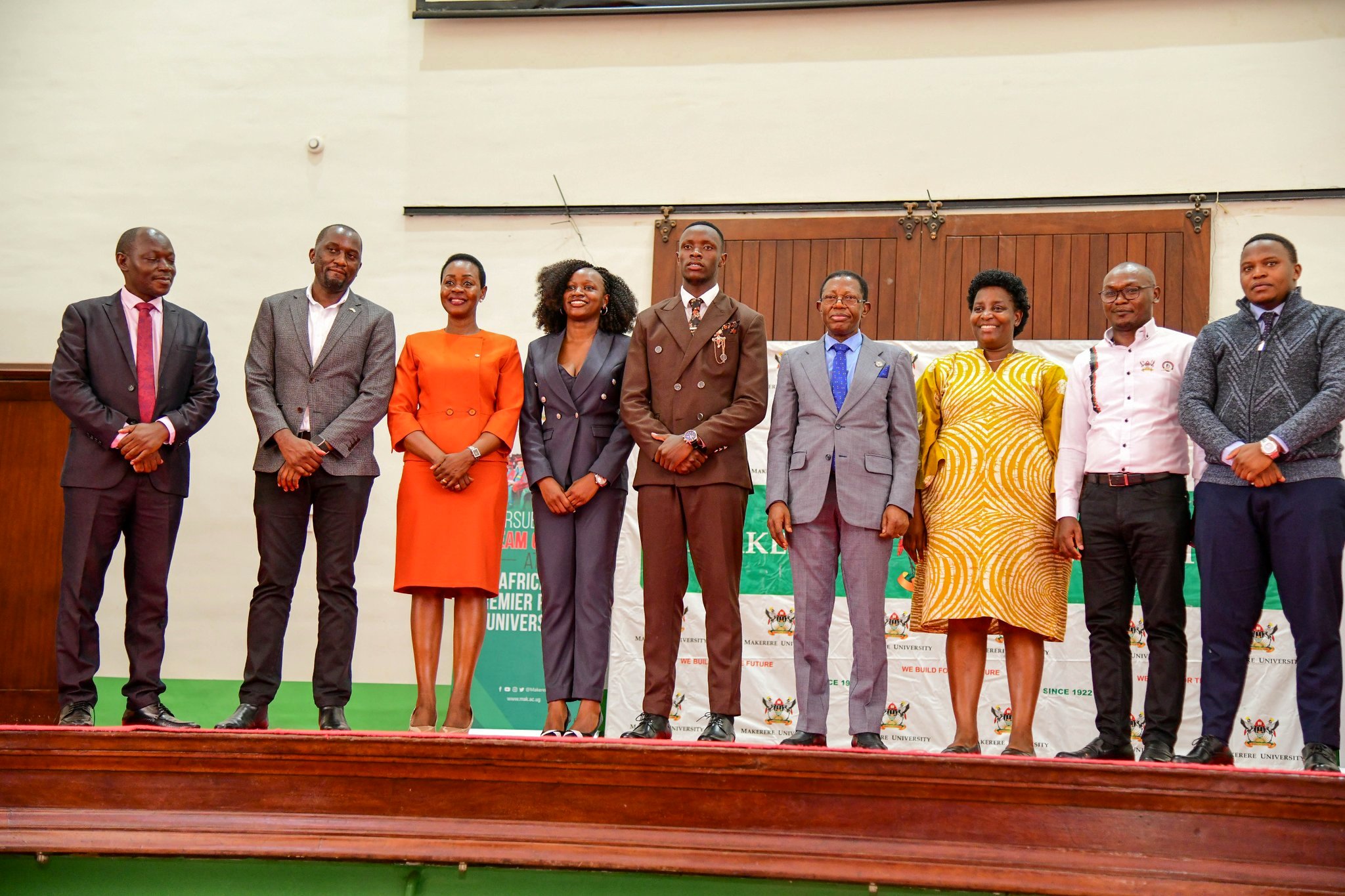 The Ag. Vice Chancellor-Prof. Buyinza Mukadasi (4th R) with 91st Guild President-H.E. Ssentamu Churchill James (C) and Vice President-H.E. Kadondi Gracious (4th L), as well as Members of Council and Management on 21st March 2025. Ssentamu Churchill James and Kadondi Gracious inaugurated as the 91st Guild President and Vice President, 21st March 2025, Main Hall, Main Administration Building, Makerere University, Kampala Uganda, East Africa.