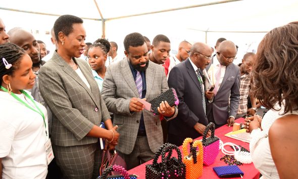 Left to Right: A CEES Official, Dr. Winifred Kabumbuli, Prof. Robert Wamala, Dr. Wilson Ssabavuma and Dr. Muhammad Kiggundu Musoke inspect products by student exhibitors on 14th March 2025. College of Education and External Studies (CEES) Open Day and Skills Expo, theme: "Empowering Future Educators Through Skills and Innovation for National Prosperity", 14th March 2025, Yusuf Lule Central Teaching Facility Auditorium, Makerere University, Kampala Uganda, East Africa.