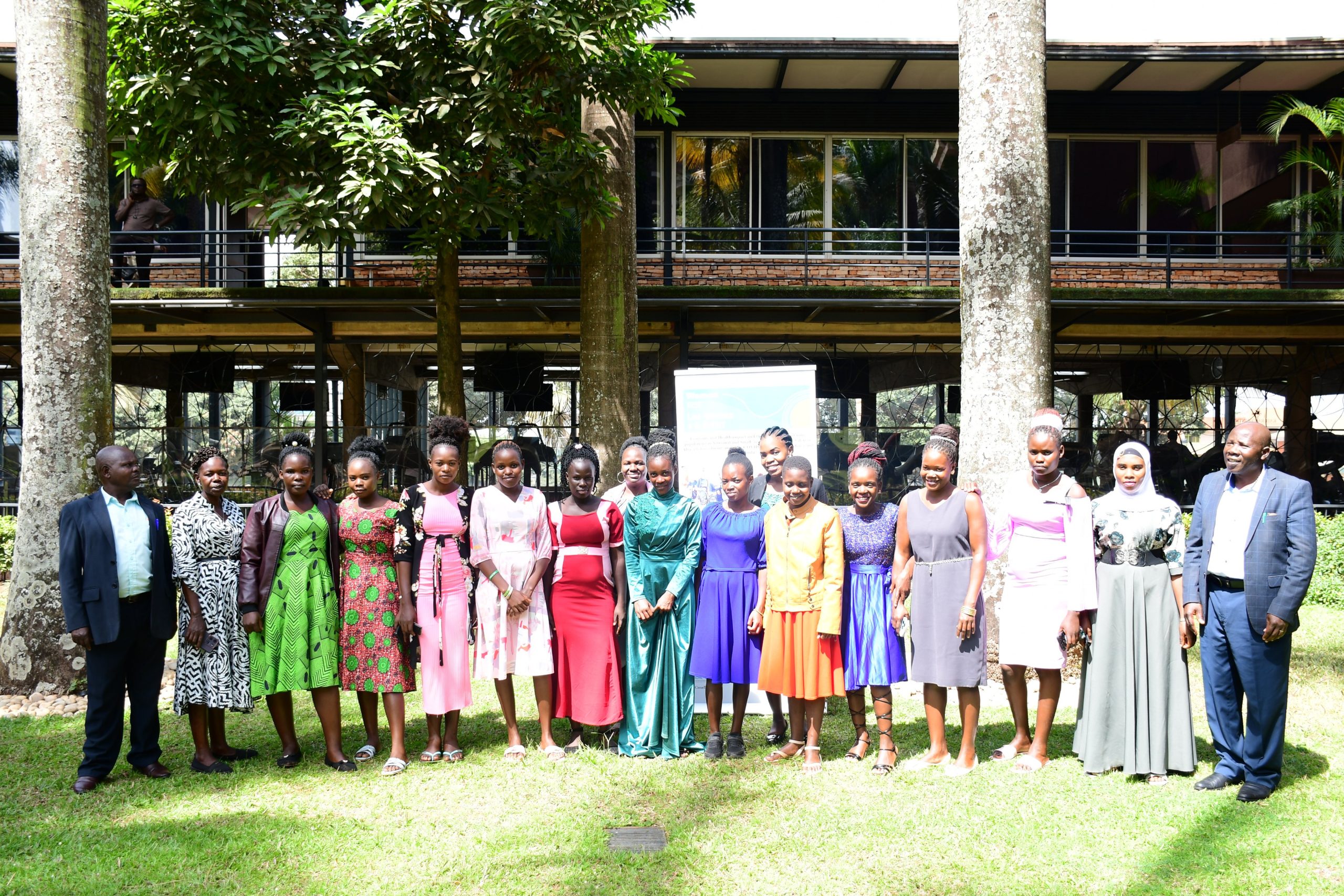 Some of the adolescent girls that took part in the study pose for a group photo with officials. Makerere University College of Business and Management Sciences (CoBAMS) Women RISE project titled, “Economic and Health Impact and the Resilience of Last Mile Populations in Artisanal and Small-Scale Mining Unplanned Settlements in Sub-Saharan Africa Before, During and After COVID-19,” focused on Ghana and Uganda as case studies, Workshop, 13th March 2025, Kampala Uganda, East Africa.