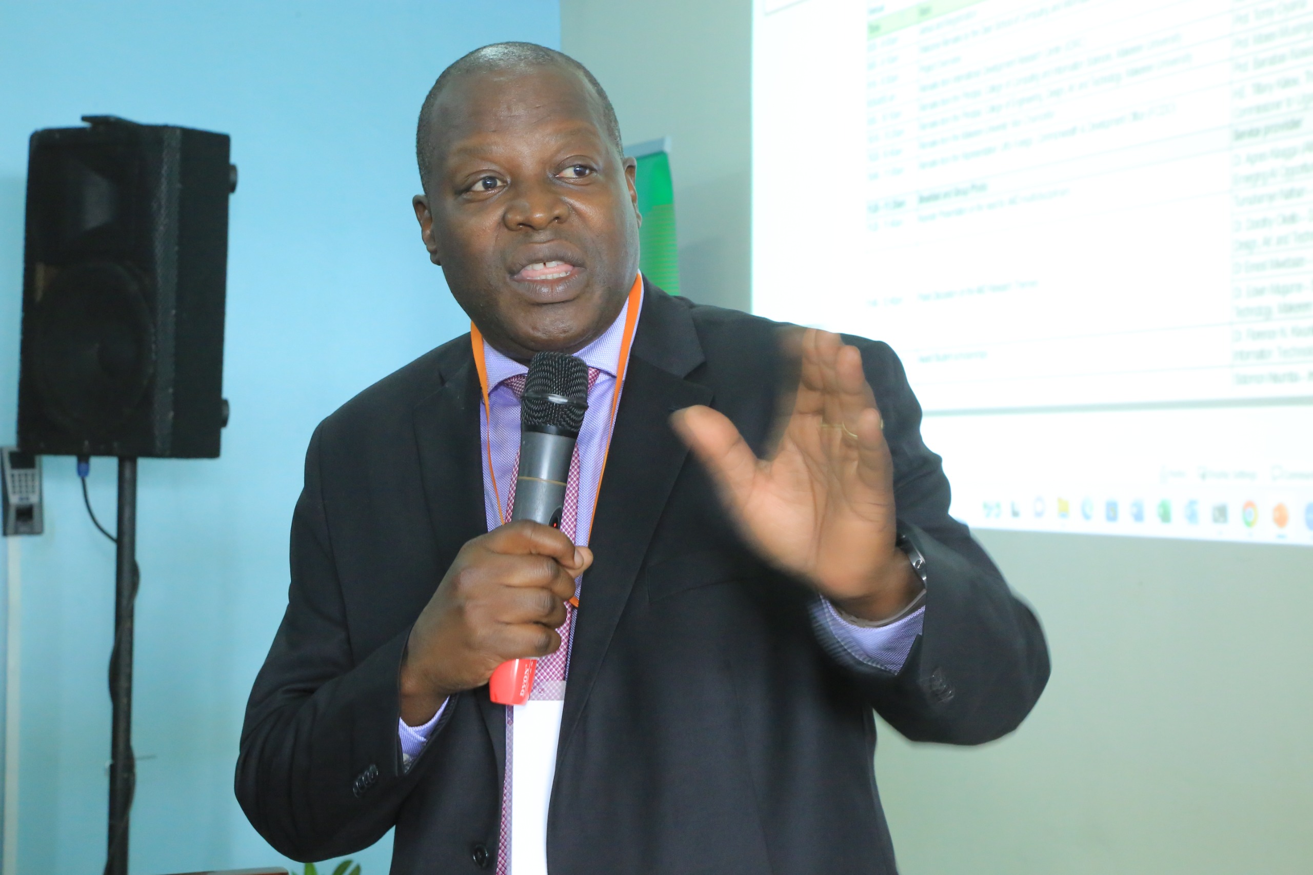 Prof. Tonny Oyana speaking. Official launch of the Makerere University Centre for Artificial Intelligence and Data Science (Mak-CAD), a hub dedicated to advancing AI research and innovation for Africa’s development. Theme: “Building Responsible AI Research and Innovations for Impact,” 13th March 2025, College of Computing and Information Sciences (CoCIS), Block B, Kampala Uganda, East Africa.