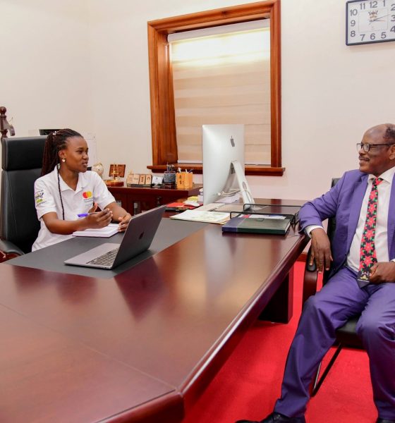 Prof. Barnabas Nawangwe (Right) listens to Elizabeth Gabeya (seated at his desk) during the unforgettable experience. 21-year-old Elizabeth Gabeya, a Bachelor of Agricultural and Rural Innovation First Year Mastercard Foundation Scholar at Makerere University, takes charge of the Vice Chancellor's office for two days- March 10th and 11th 2025, Main Building, Kampala Uganda, East Africa.