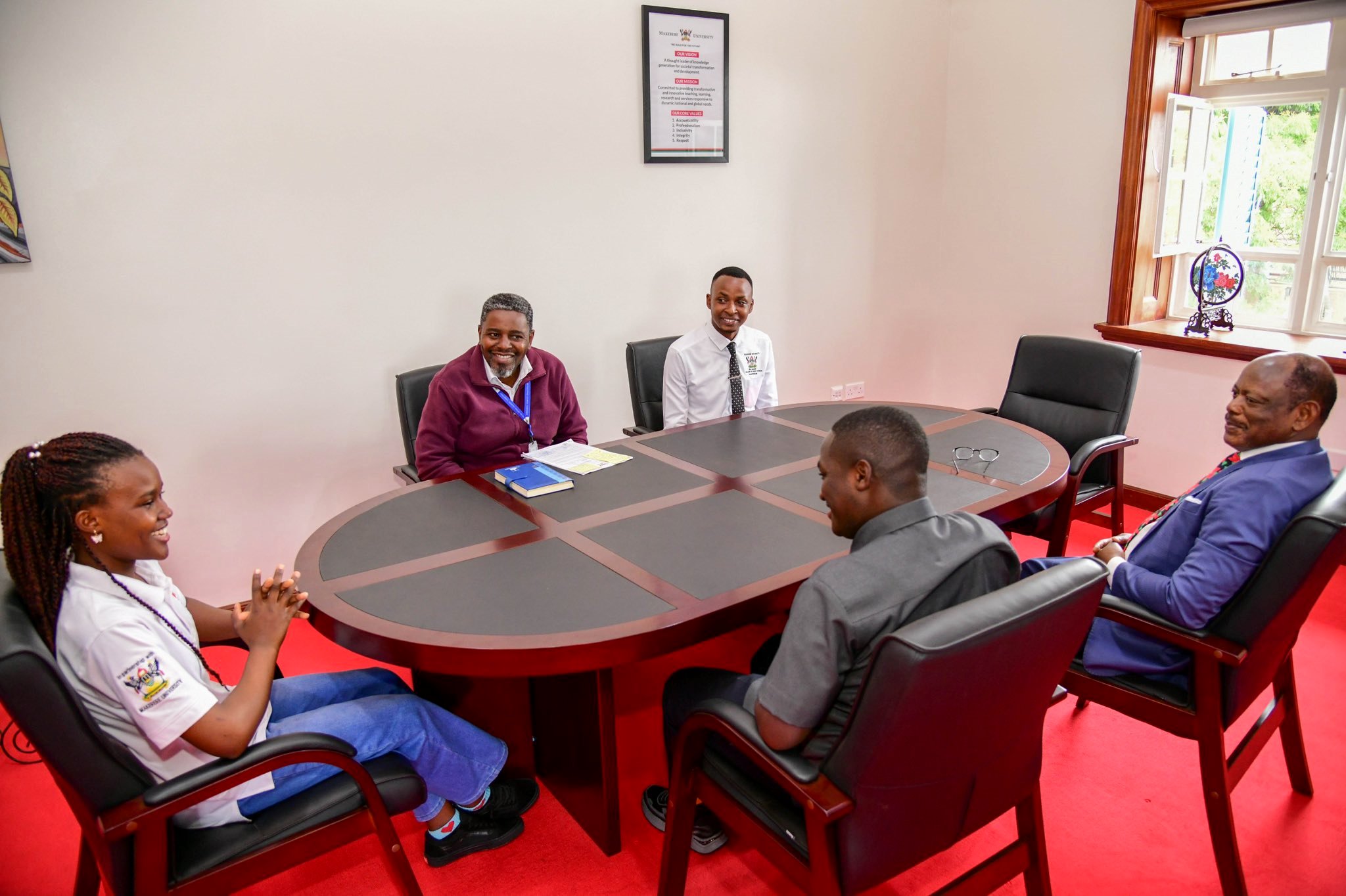 Elizabeth Gabeya (Left) chairs one of the meetings during her experience as Vice Chancellor. 21-year-old Elizabeth Gabeya, a Bachelor of Agricultural and Rural Innovation First Year Mastercard Foundation Scholar at Makerere University, takes charge of the Vice Chancellor's office for two days- March 10th and 11th 2025, Main Building, Kampala Uganda, East Africa.