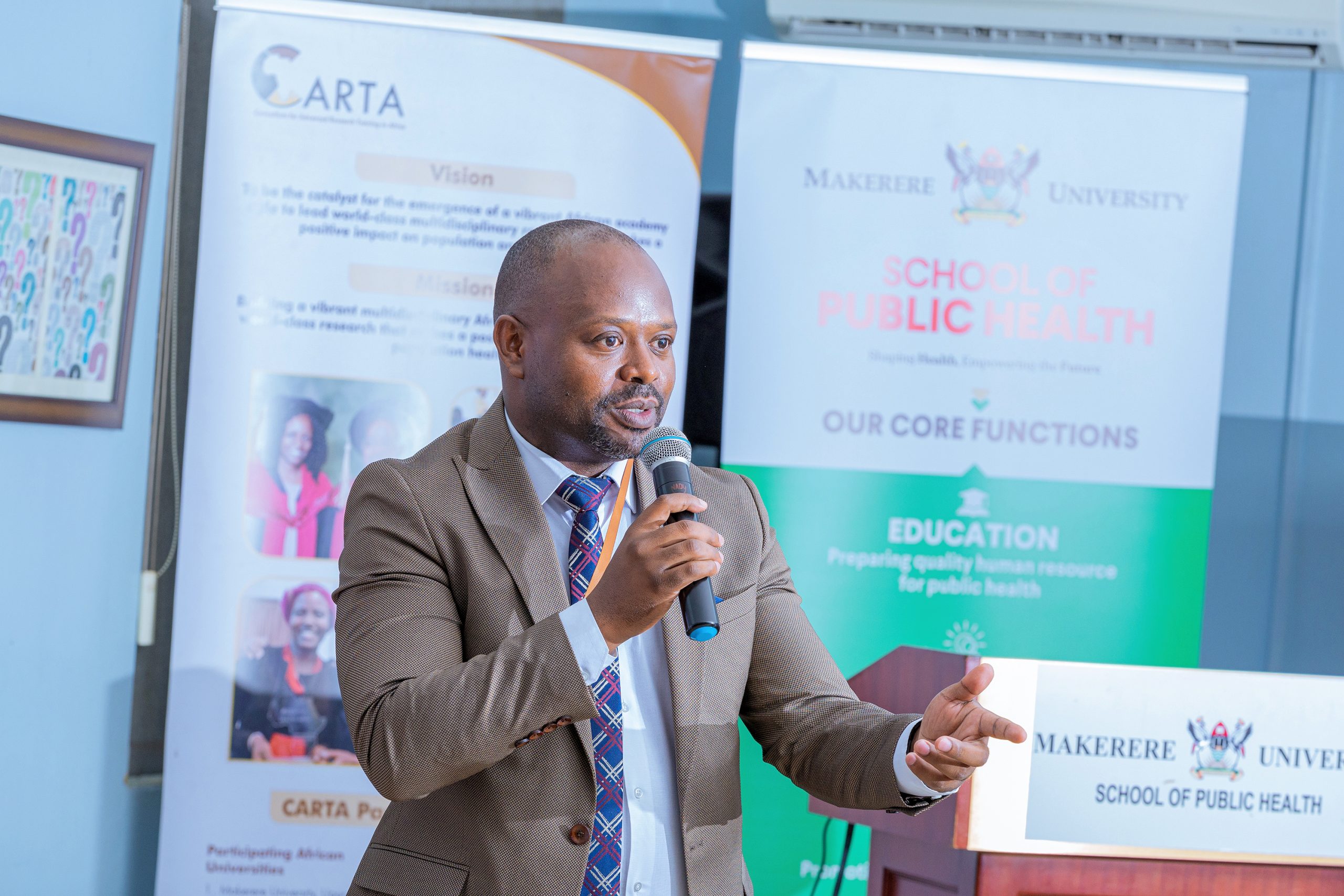 Dr. JB Isunju addressing the Fellows during the opening of JAS 1 for the 11th Cohort. 3rd March 2025. Joint Advanced Seminars (JAS) 1 training for 11th Cohort of the Consortium for Advanced Research Training in Africa (CARTA) doctoral fellowship, 3rd March 2025, Makerere University School of Public Health, Kampala Uganda, East Africa.