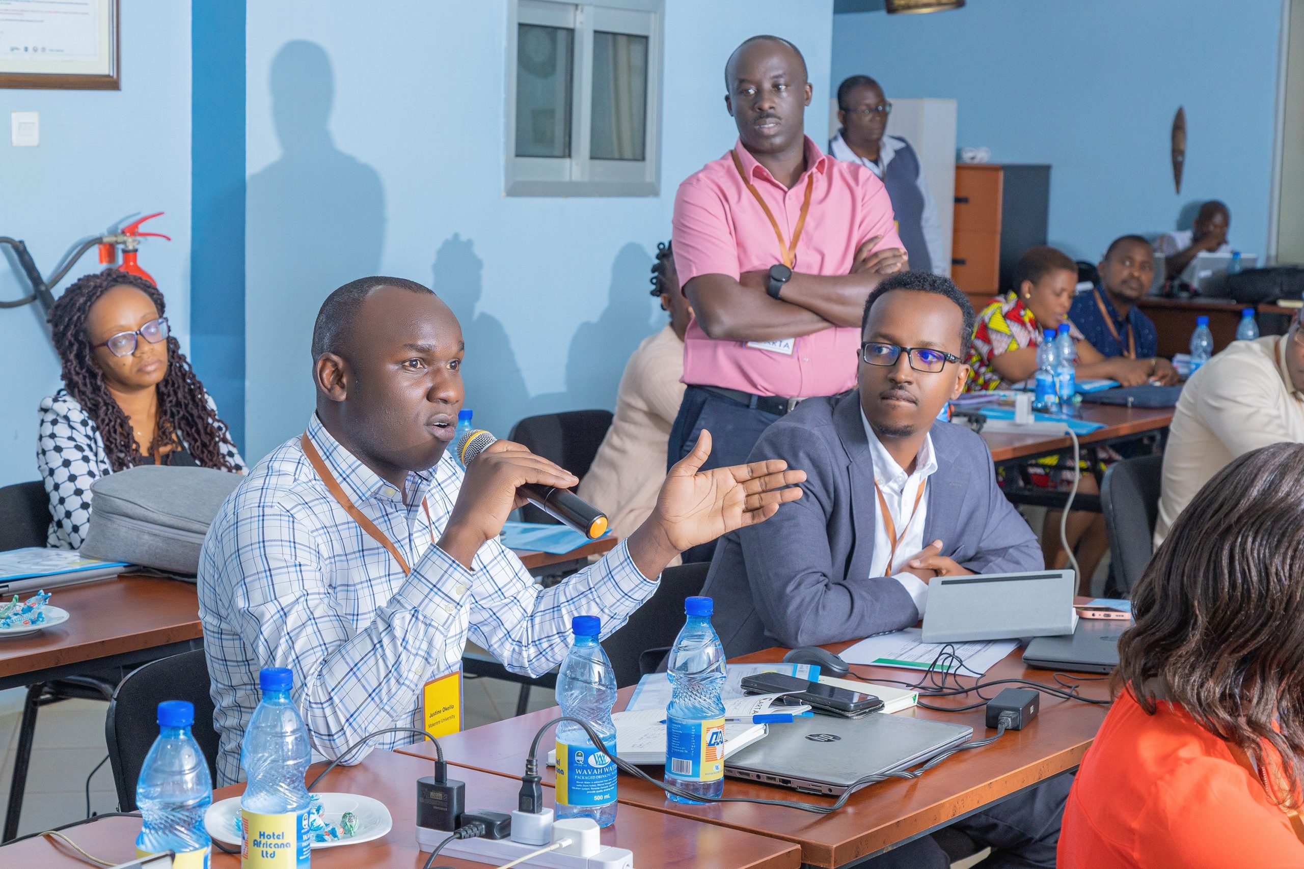 Joint Advanced Seminars (JAS) 1 training for 11th Cohort of the Consortium for Advanced Research Training in Africa (CARTA) doctoral fellowship, 3rd March 2025, Makerere At the centre, Gallad listening keenly to Uganda's Justine Okello, during JAS 1 training for the 11th Cohort in Kampala. 3rd March 2025. University School of Public Health, Kampala Uganda, East Africa.