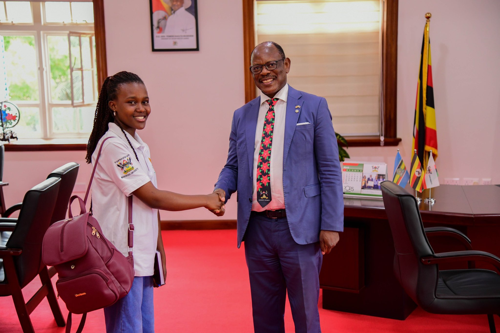 Elizabeth Gabeya (Left) with Prof. Barnabas Nawangwe at his office