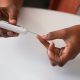 High angle woman checking glucose levels. Photo courtesy of Freepik. Makerere University School of Public Health (MakSPH), Kampala Uganda, East Africa.