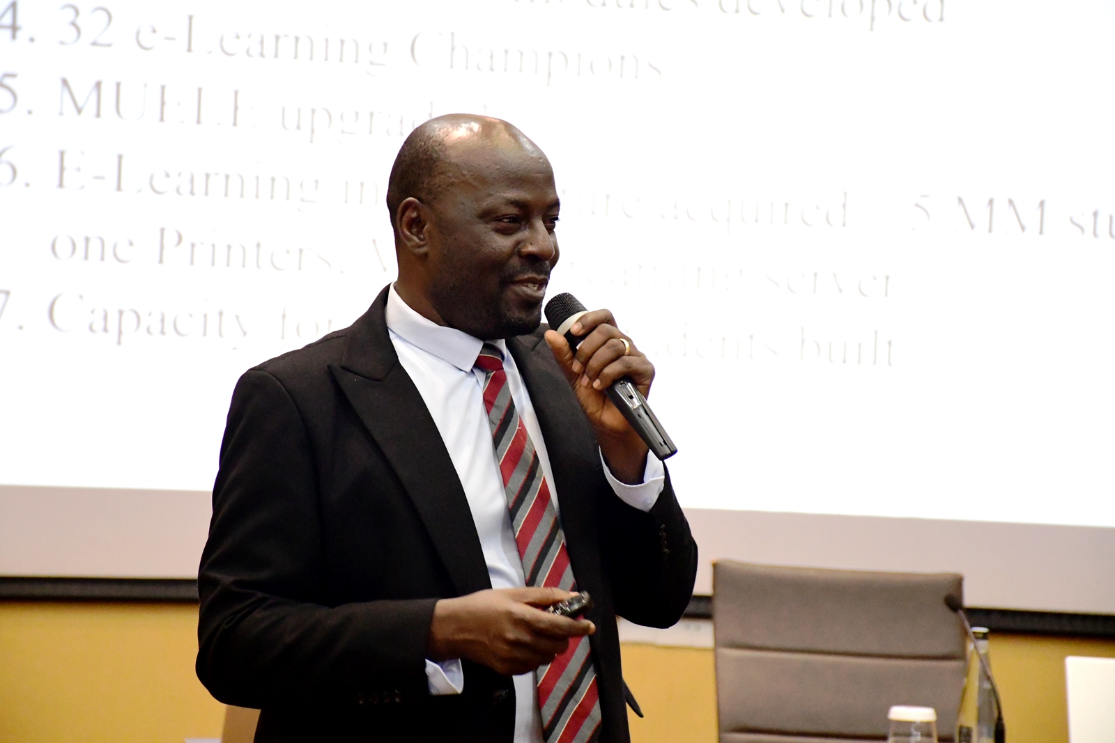 Prof. Paul Birevu Muyinda presents the findings. Institute of Open, Distance and e-Learning (IODeL), College of Education and External Studies (CEES) disseminating results of phase 1 of the e-Learning initiative at Makerere University, Makerere University, Kampala Uganda, East Africa supported by Mastercard Foundation, Arizona State University (ASU)-USA, to over 75 participants and key stakeholders, 24th April 2025, Speke Resort Munyonyo.