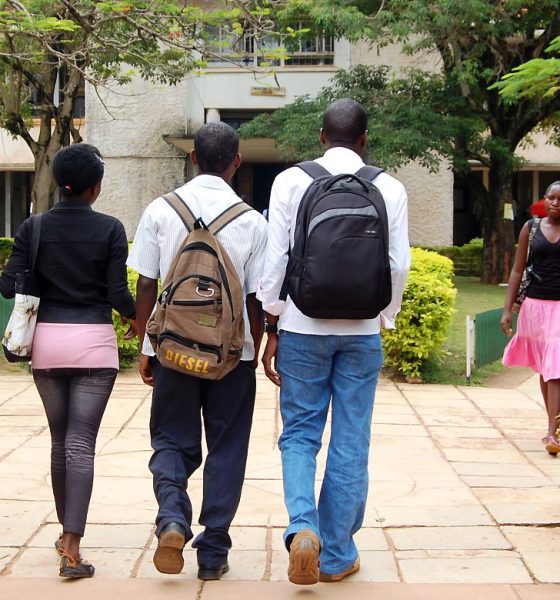 Students walk into the Arts Quadrangle, College of Humanities and Social Sciences, Makerere University, Kampala Uganda, East Africa.