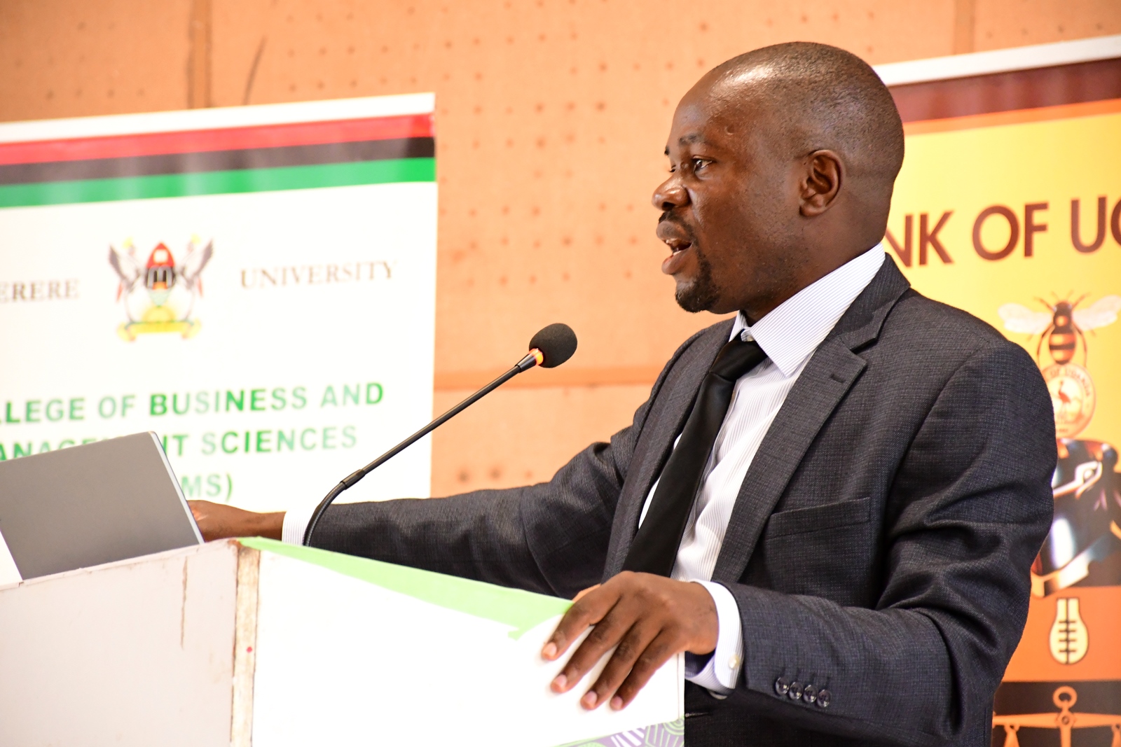The Dean, School of Economics, Dr. Ibrahim Mike Okumu addressing students during the Career Talk. Bank of Uganda in partnership with College of Business and Management Sciences (CoBAMS) career talk targeting students studying economics. Theme: ‘Beyond the Books-Positioning Economics Students for National and Global Relevance,’ Commits to Annual Monetary policy engagements, 14th April 2025, Yusuf Lule Central Teaching Facility Auditorium, Makerere University, Kampala Uganda, East Africa.