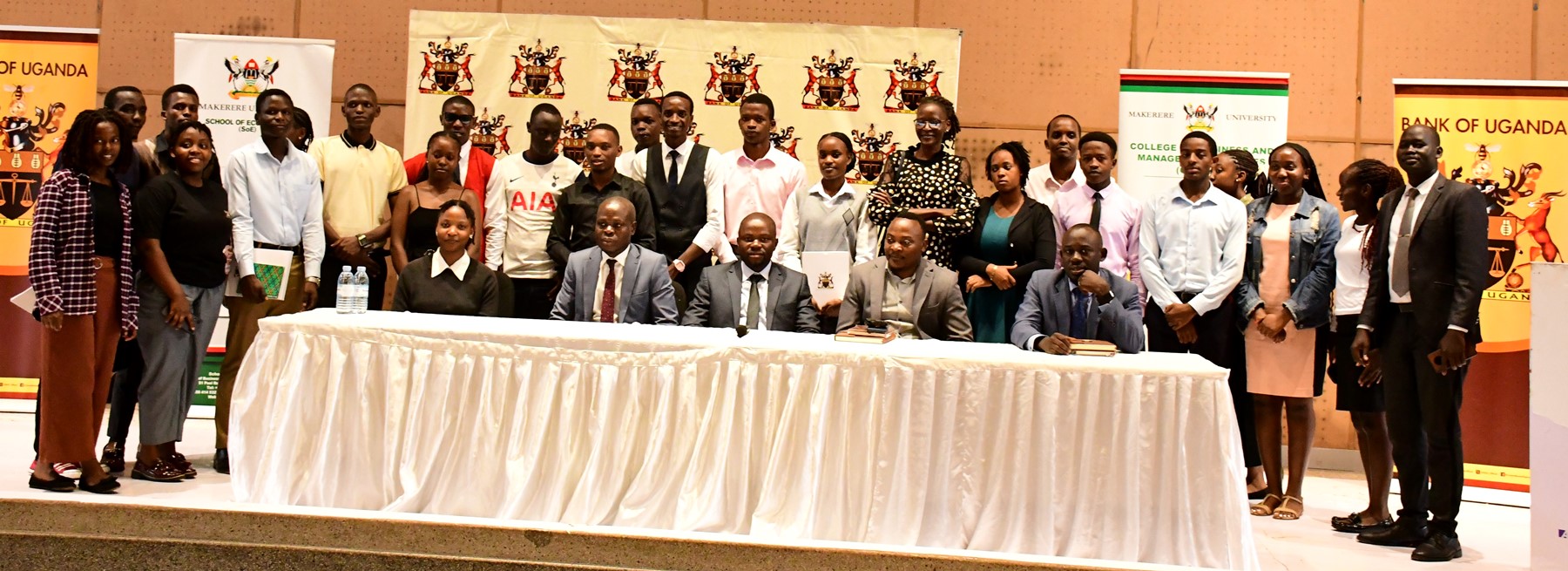 Career Talk participants in a group photo. Bank of Uganda in partnership with College of Business and Management Sciences (CoBAMS) career talk targeting students studying economics. Theme: ‘Beyond the Books-Positioning Economics Students for National and Global Relevance,’ Commits to Annual Monetary policy engagements, 14th April 2025, Yusuf Lule Central Teaching Facility Auditorium, Makerere University, Kampala Uganda, East Africa.