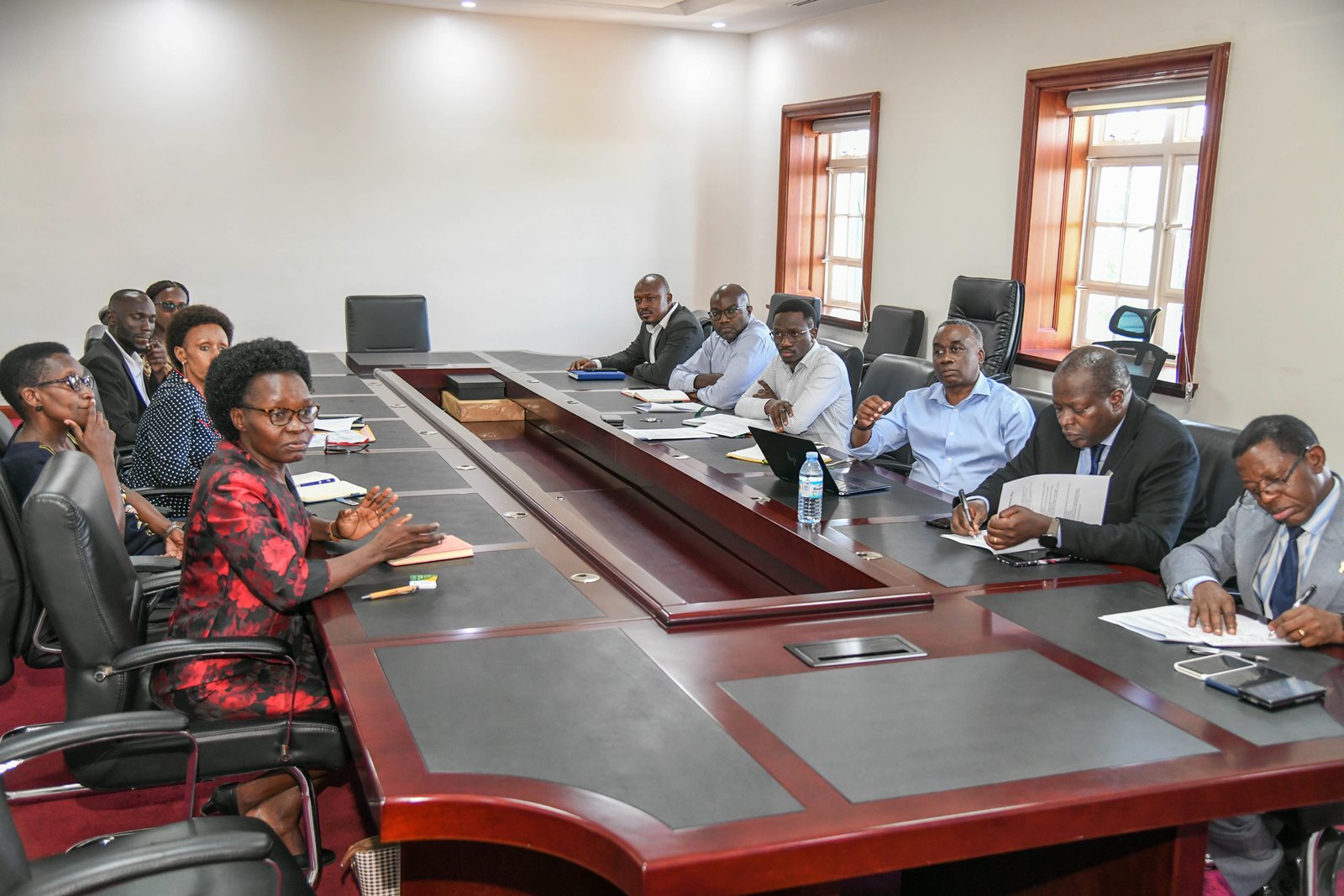 Ms. Elinor Wanyama Chemonges (Left) presents on behalf of the delegation. Uganda Digital Pathways Initiative Meeting with Deborah’s Impact Projects Africa-Uganda (DIPA-U), Africa World Train Center (AWTC) and the Office of the First Lady of Uganda (OFLU), with Ugandan Higher Education Institutions (HEIs), 29th April 2025, Makerere University, Kampala, East Africa.