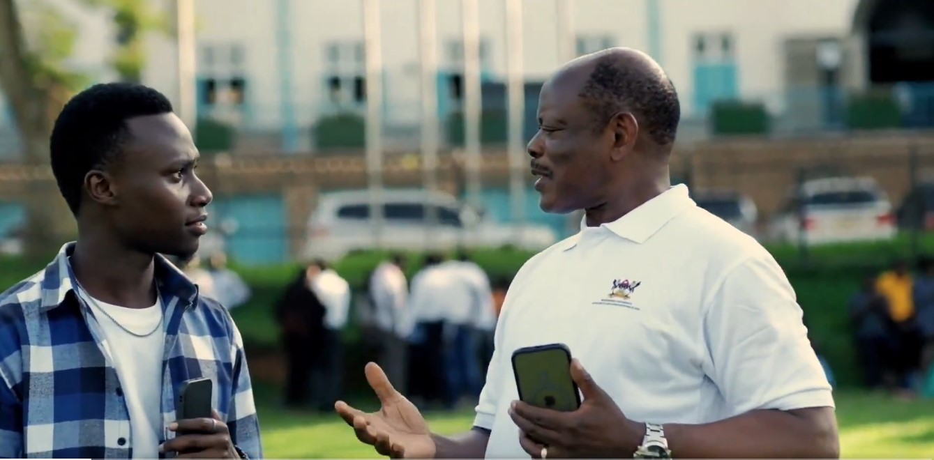 Prof. Barnabas Nawangwe (Right) with Kasule Raymond interacting about the Research and Innovations Week 2025