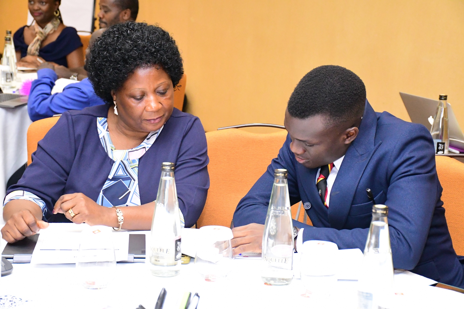 Hon. Julius Kiganda (Right) with Dr. Harriet Nabushawo. Institute of Open, Distance and e-Learning (IODeL), College of Education and External Studies (CEES) disseminating results of phase 1 of the e-Learning initiative at Makerere University, Makerere University, Kampala Uganda, East Africa supported by Mastercard Foundation, Arizona State University (ASU)-USA, to over 75 participants and key stakeholders, 24th April 2025, Speke Resort Munyonyo.