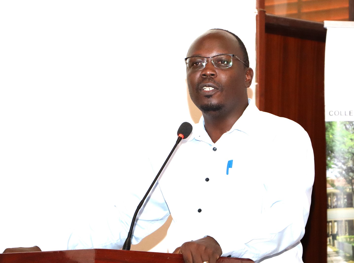 Dr. Dickson Kanakulya speaking during the opening session. College of Humanities and Social Sciences (CHUSS) a historic public dialogue between Dr. Jimmy Spire Ssentongo and Dr. Yahaya Hills Kagali Sekagya, titled “Traditional Spirituality, Herbal Medicine, Witchcraft and Questions of Truth.” 29th April 2025, College of Engineering, Design, Art and Technology (CEDAT) Conference Hall, Makerere University, Kampala Uganda, East Africa.