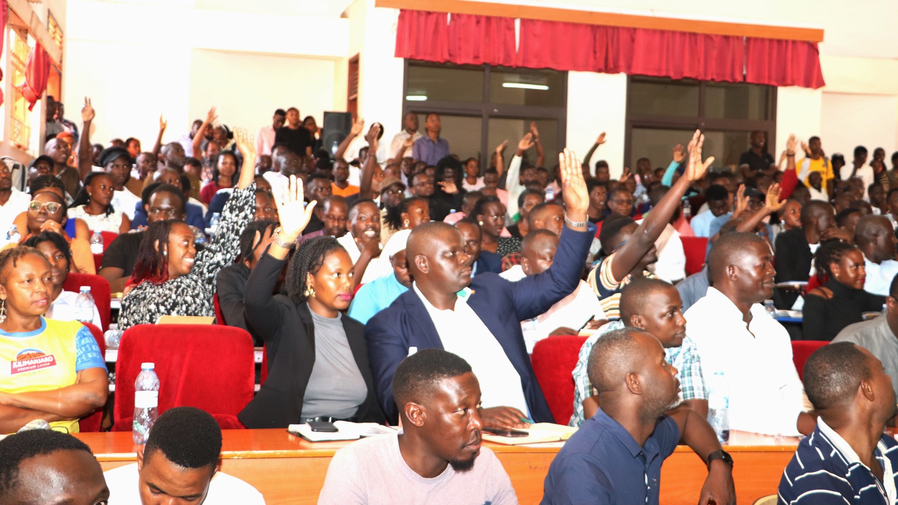 Participants seeking to ask questions after the conversation. College of Humanities and Social Sciences (CHUSS) a historic public dialogue between Dr. Jimmy Spire Ssentongo and Dr. Yahaya Hills Kagali Sekagya, titled “Traditional Spirituality, Herbal Medicine, Witchcraft and Questions of Truth.” 29th April 2025, College of Engineering, Design, Art and Technology (CEDAT) Conference Hall, Makerere University, Kampala Uganda, East Africa.