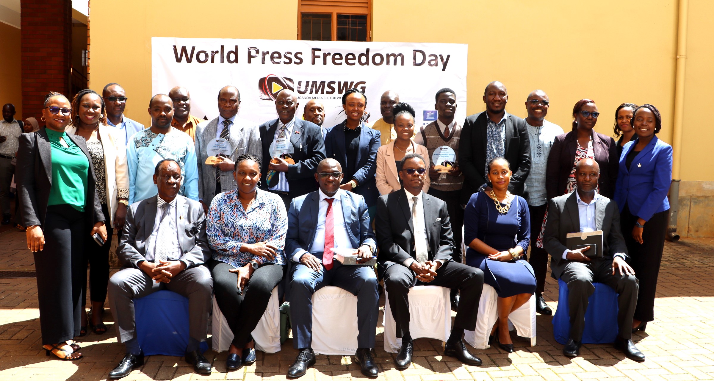 A section of attendees in a group photo with the Chief Guest-Paul Ekoju and Award winners after the celebrations. Uganda Media Sector Working Group in collaboration with Makerere University Department of Journalism and Communication, CIPESA, Oslo Metropolitan University, the Uganda Human Rights Commission, the African Centre for Media Excellence, UNESCO, the Uganda Media Council, and Media Focus on Africa commemorating World Press Freedom Day, global theme “Defending the Truth in an Age of Polarization and Distrust”, 6th May 2025, CEDAT Conference Hall, Kampala, East Africa.