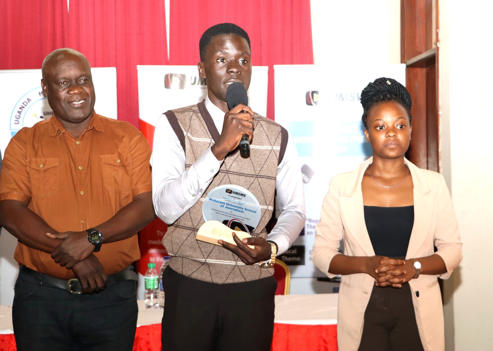 One of the Makerere students speaking at the award ceremony. Uganda Media Sector Working Group in collaboration with Makerere University Department of Journalism and Communication, CIPESA, Oslo Metropolitan University, the Uganda Human Rights Commission, the African Centre for Media Excellence, UNESCO, the Uganda Media Council, and Media Focus on Africa commemorating World Press Freedom Day, global theme “Defending the Truth in an Age of Polarization and Distrust”, 6th May 2025, CEDAT Conference Hall, Kampala, East Africa.