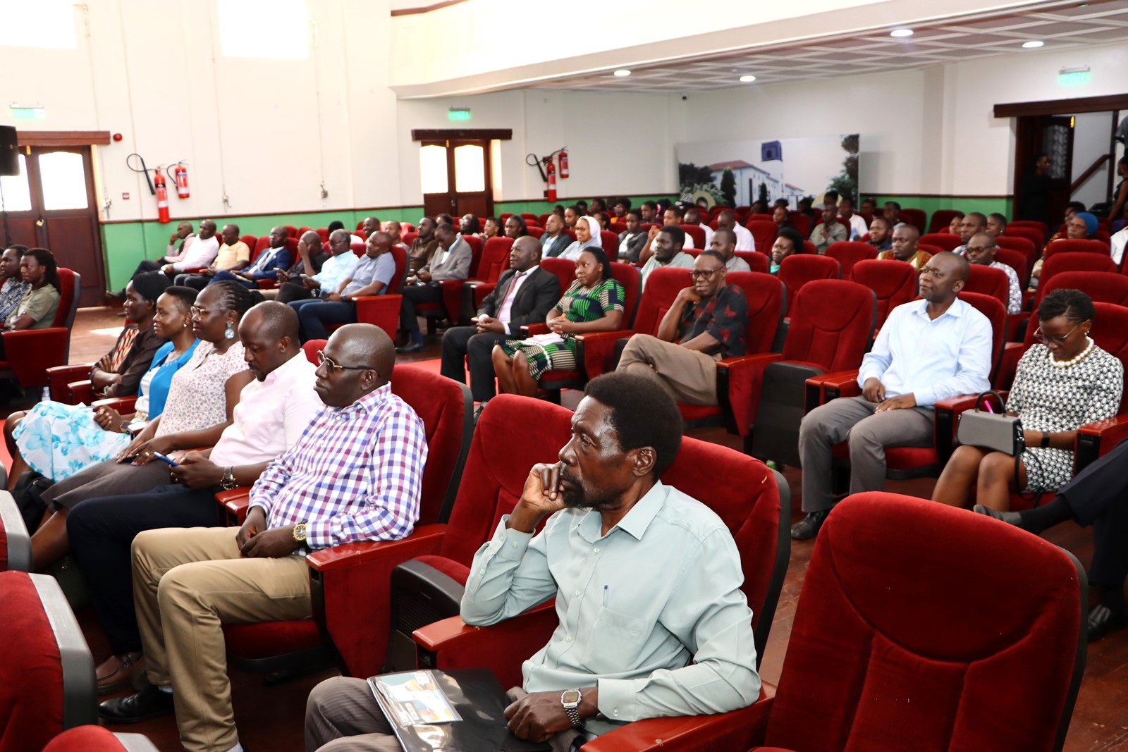 The audience watching the film. Department of Literature, School of Languages, Literature and Communication, College of Humanities and Social Sciences (CHUSS) screening of Tuko Pamoja, a documentary by Dr. Cindy Magara, Nyati Motion Pictures, 13th May 2025, Main Hall, Makerere University, Kamapala Uganda, East Africa.