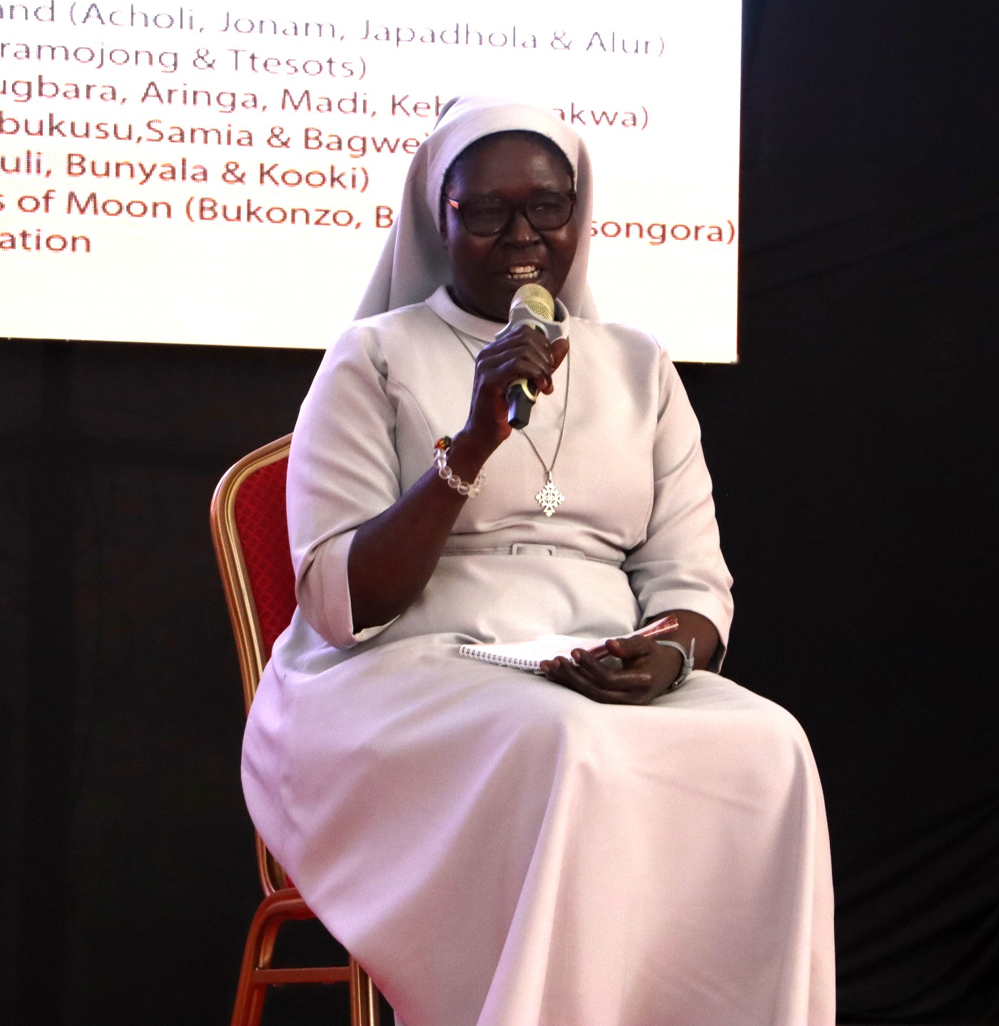 Prof. Dipio Dominica contributing to the discussion. Department of Literature, School of Languages, Literature and Communication, College of Humanities and Social Sciences (CHUSS) screening of Tuko Pamoja, a documentary by Dr. Cindy Magara, Nyati Motion Pictures, 13th May 2025, Main Hall, Makerere University, Kamapala Uganda, East Africa.
