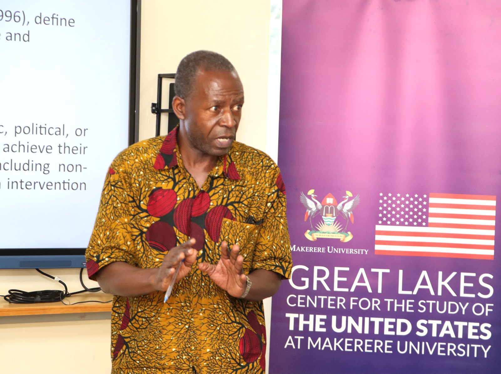 Mr. Lumumba Bwire presenting on Politics of Democracy. The Centre for United States Studies at Makerere University held its first research review workshop, marking the beginning of an ambitious academic project to publish a book examining the historical and contemporary relations between the United States and Uganda, 28th April 2025, Kampala, East Africa.